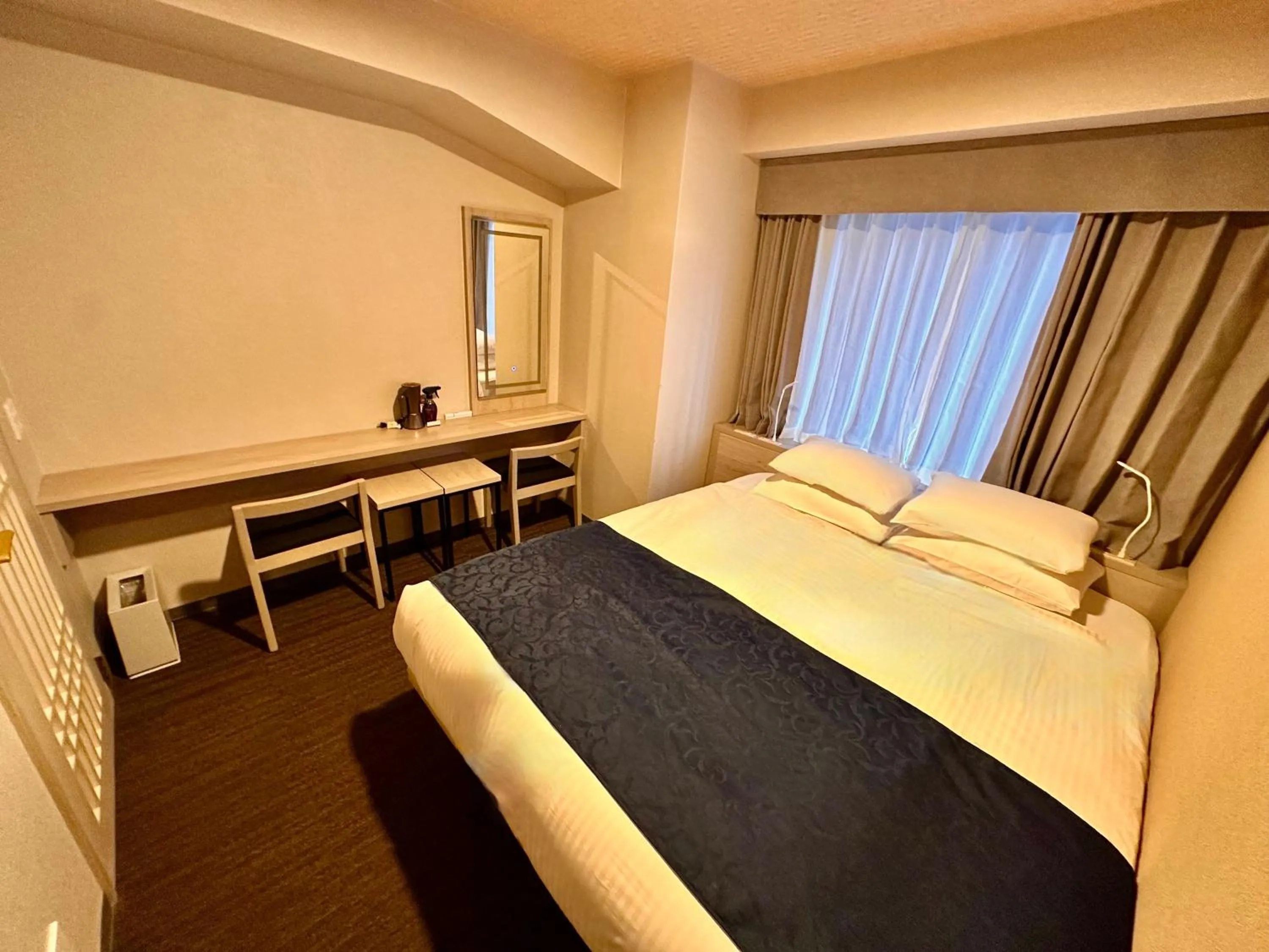 Bed in Hotel Rose Garden Shinjuku