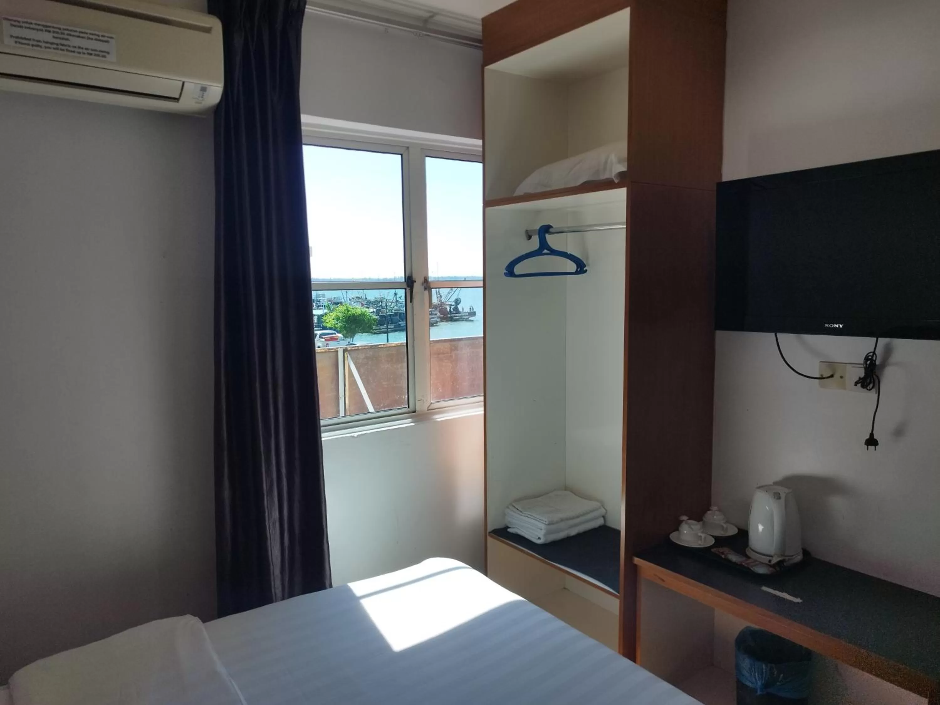 Bed in Marine Bay Hotel