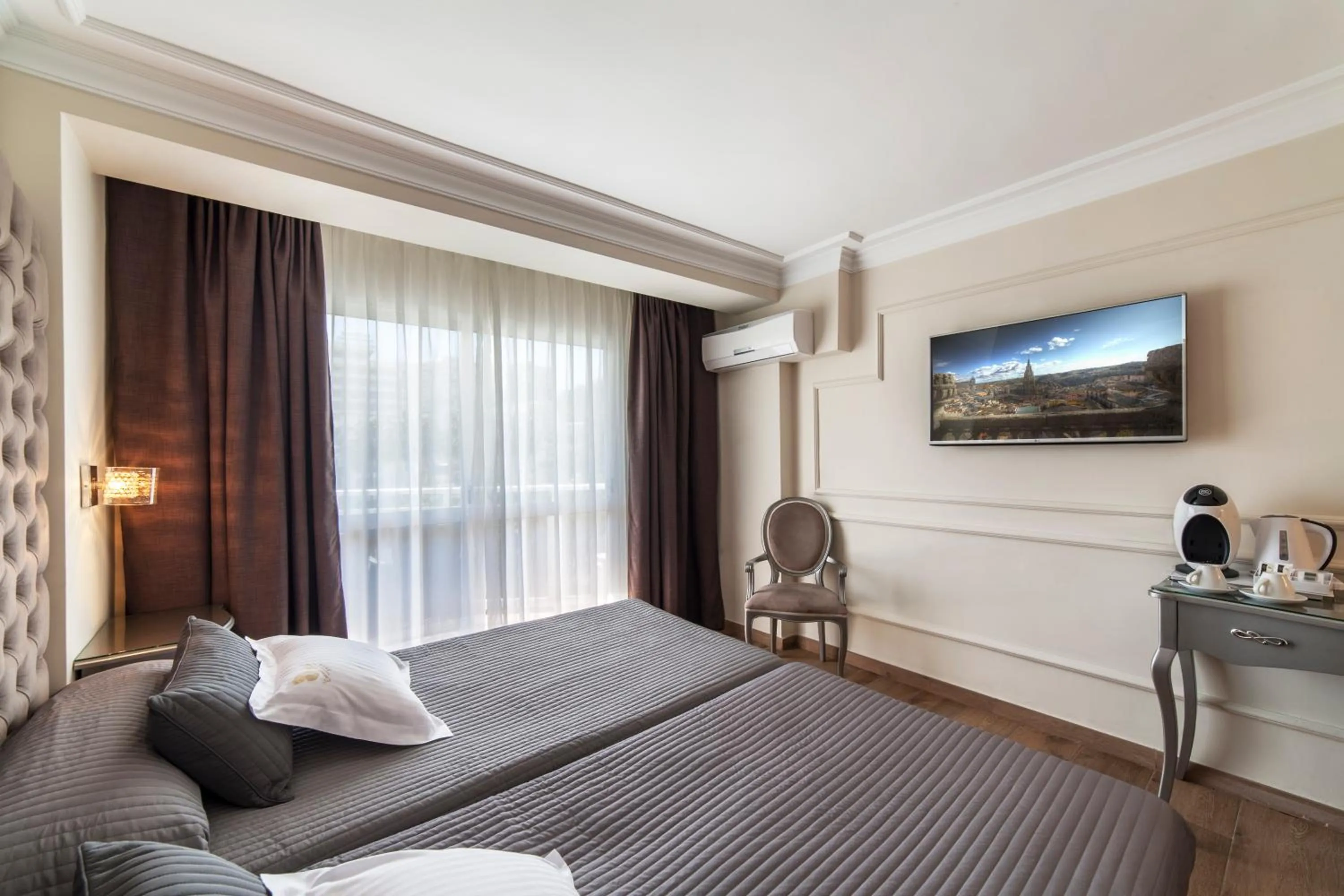 Bed in Essence Hotel Boutique