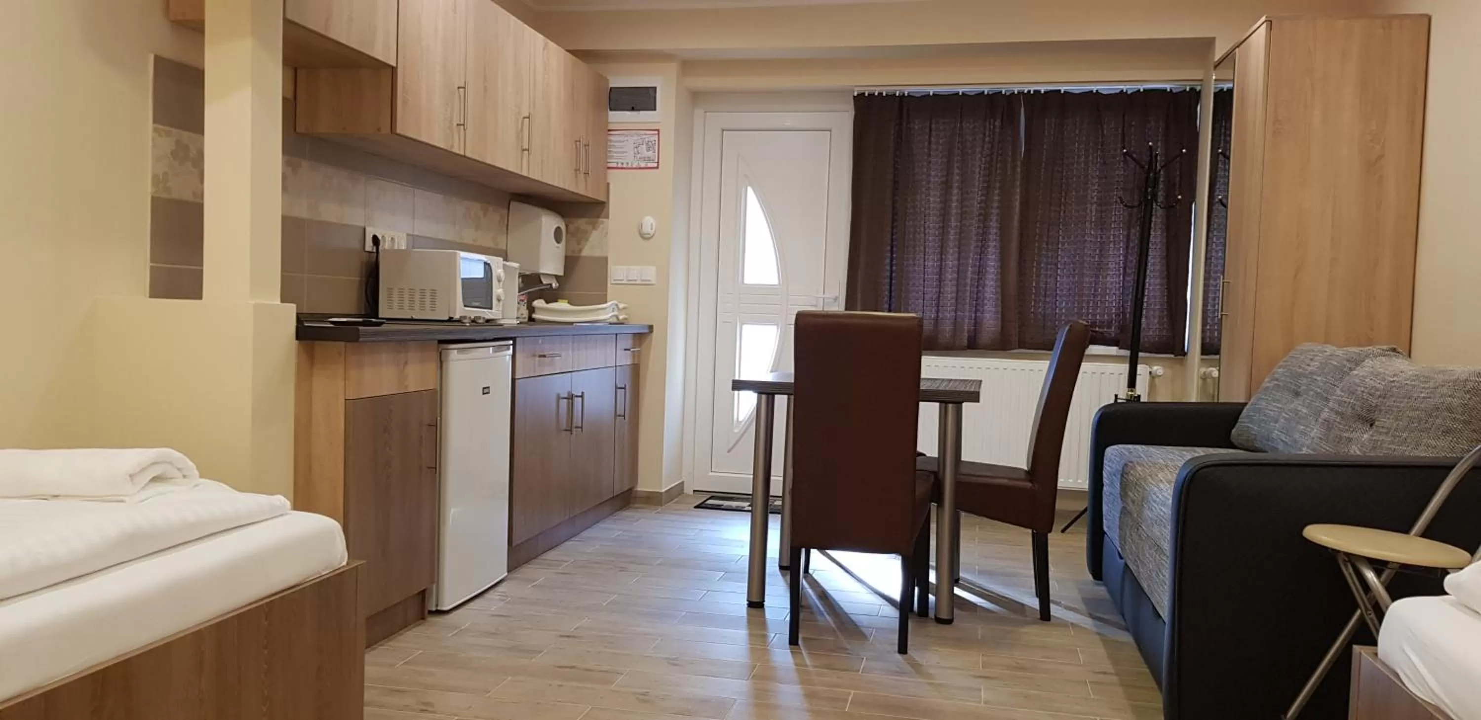 Bed in Central Panzió Gyula