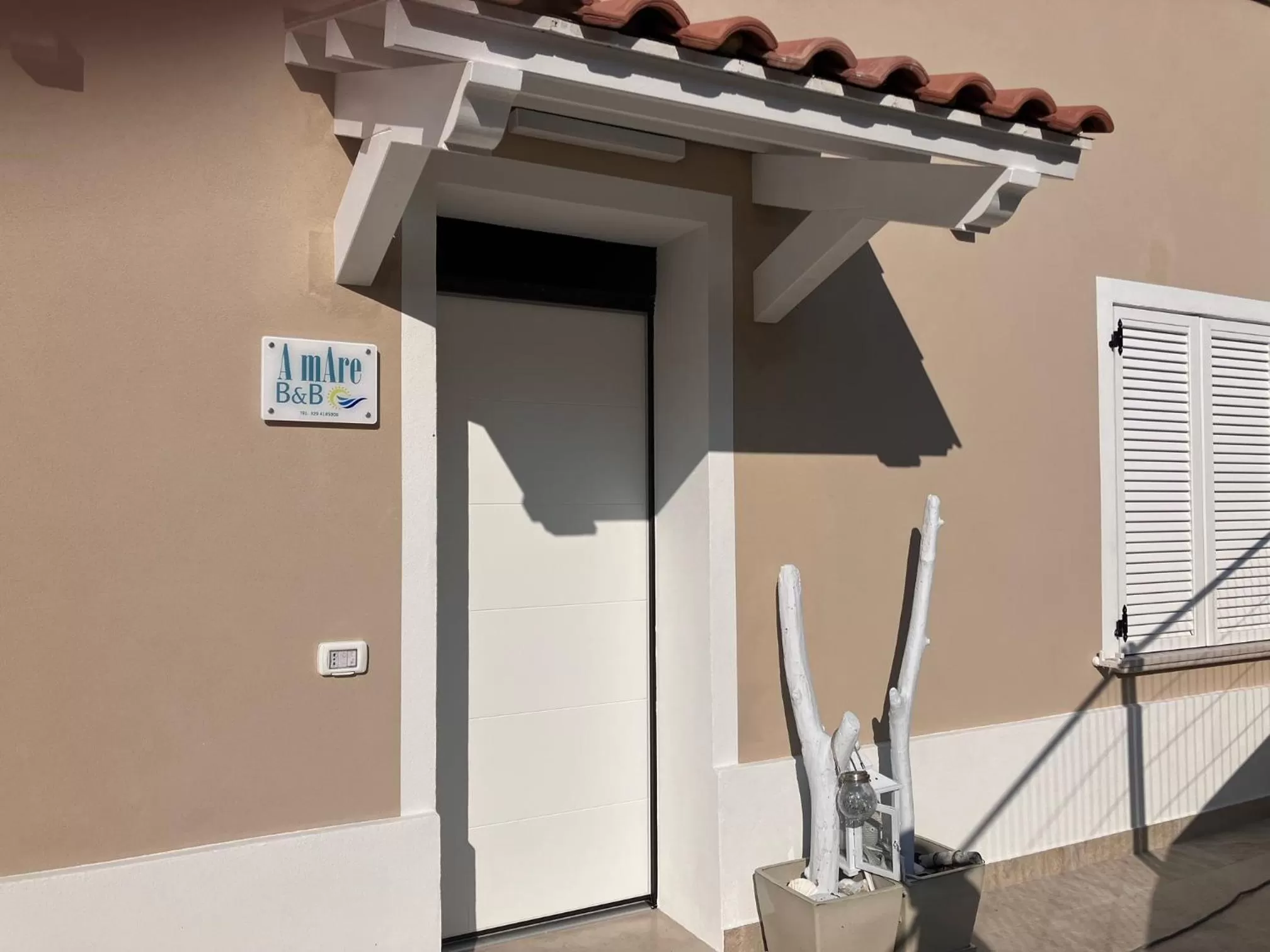 Property building in Bed & Breakfast A Mare