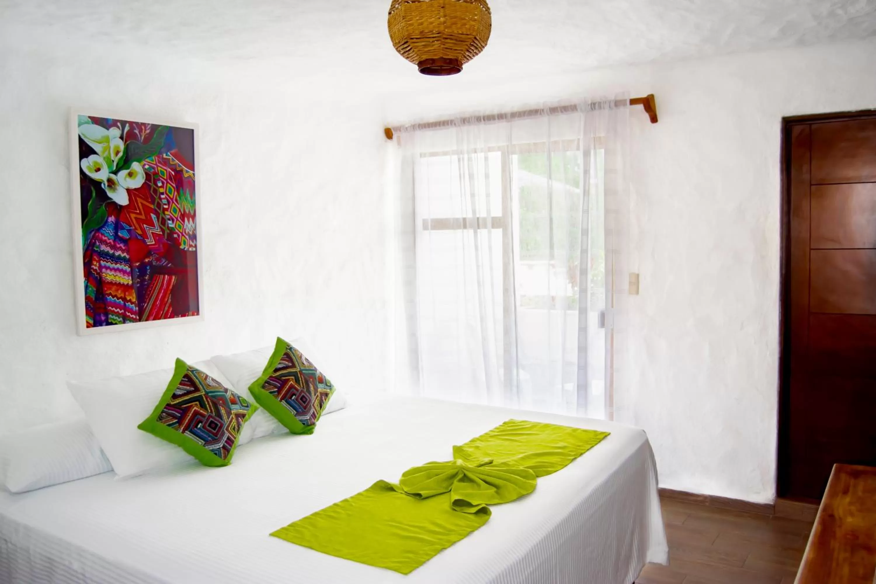 Bed in Petit Hotel Pilitas