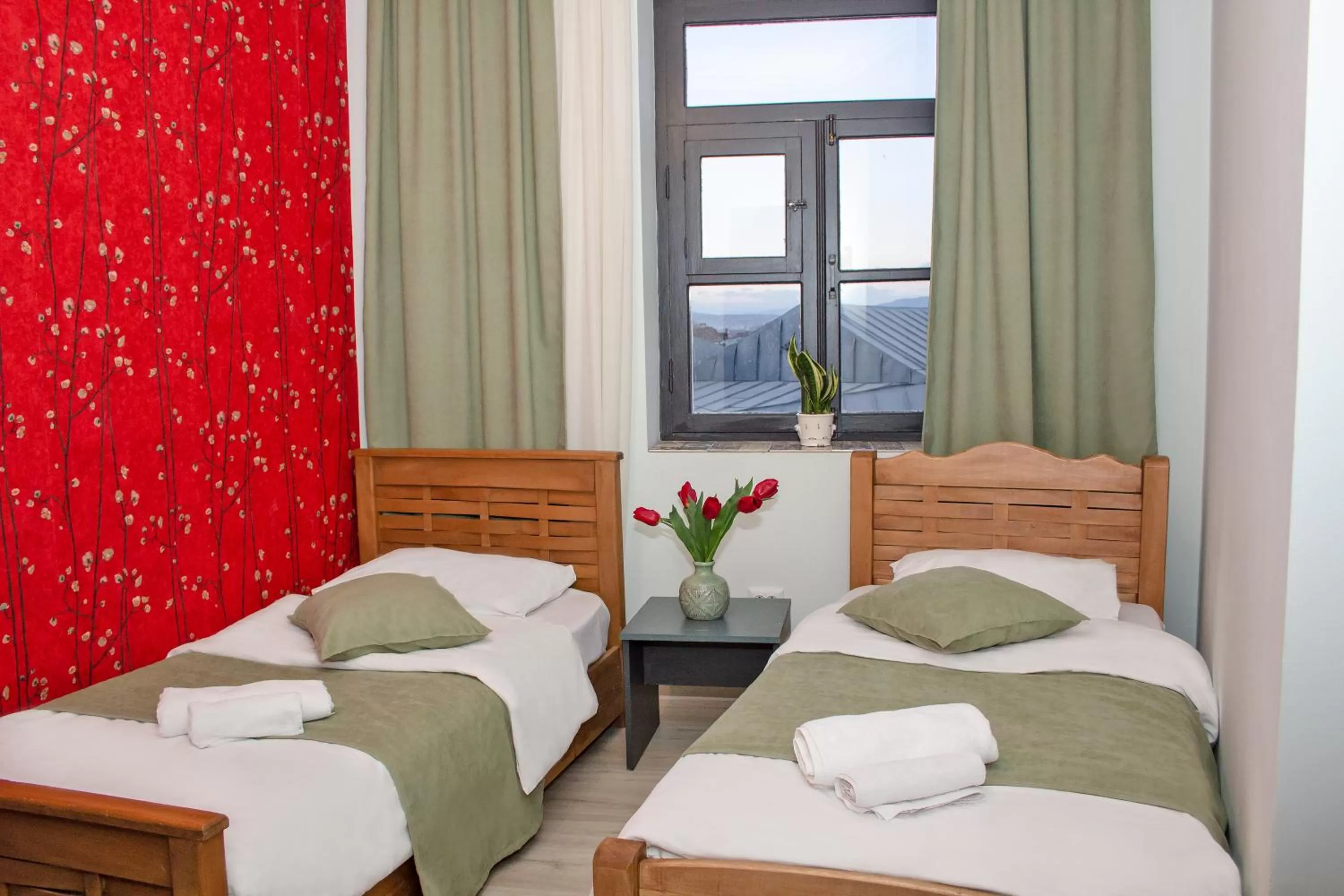 Photo of the whole room in Check Point Hotel