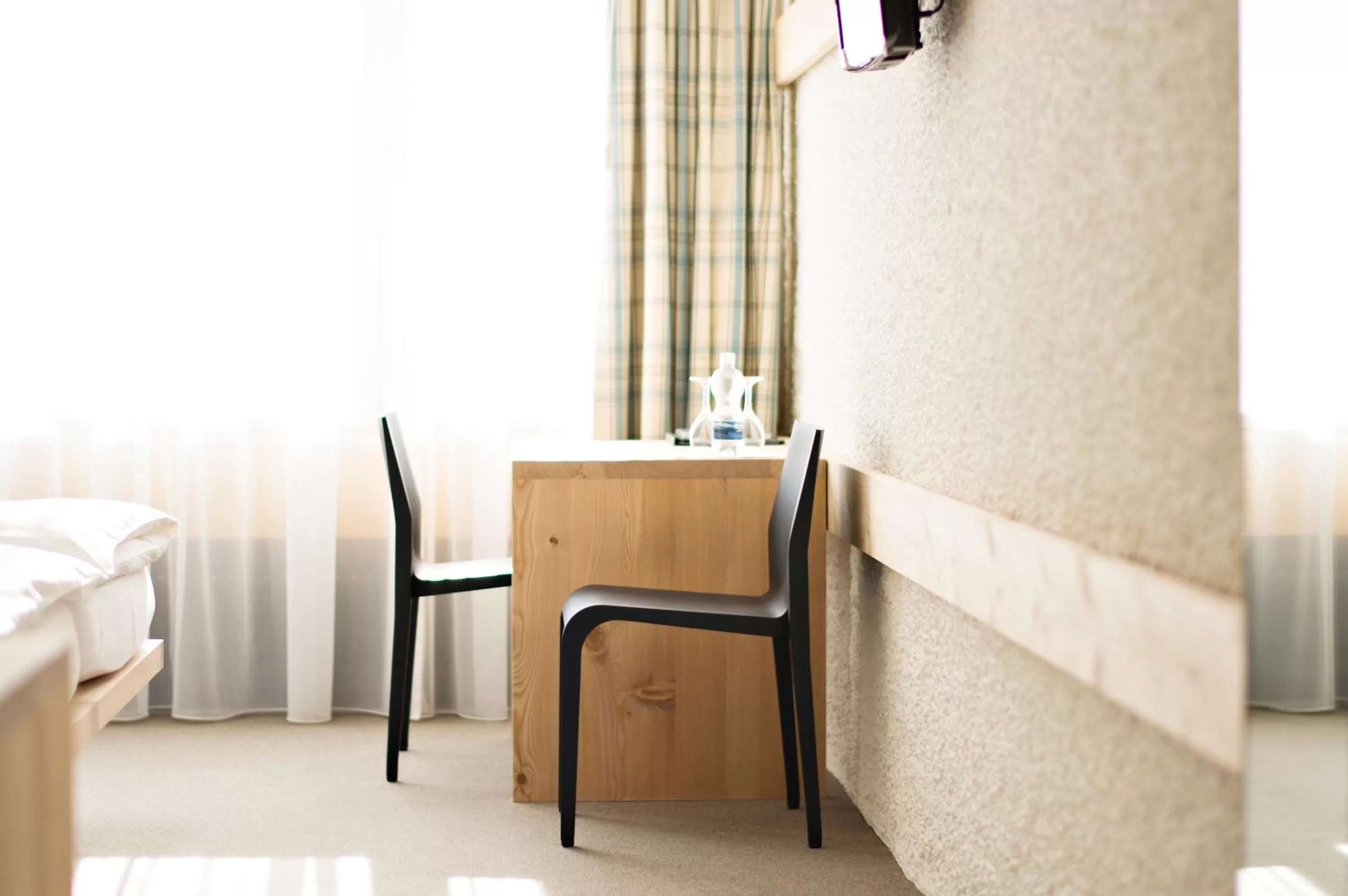 Seating area, Bed in Hauser Hotel St. Moritz