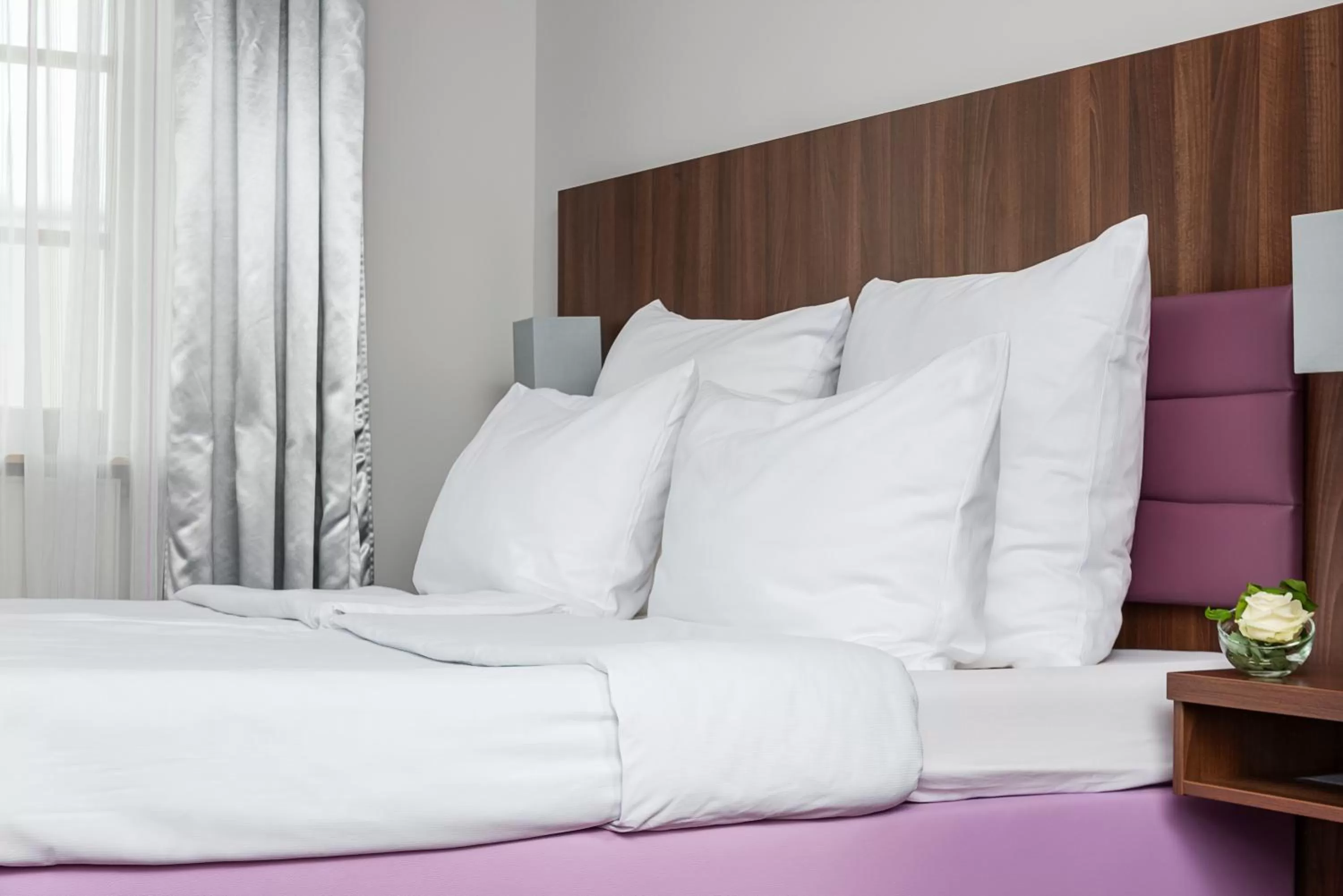 Photo of the whole room, Bed in AKZENT Hotel Laupheimer Hof