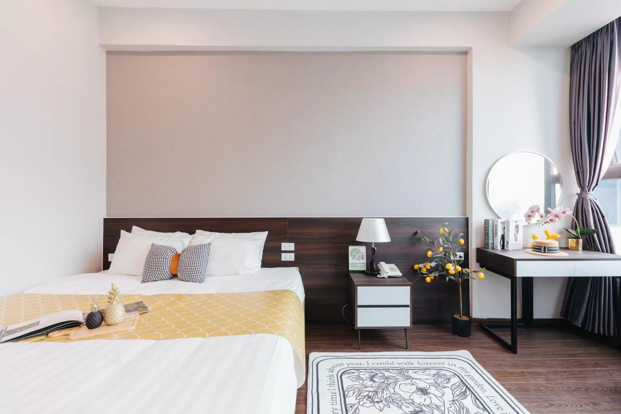 Bed in Ivy Hotel & Apartment