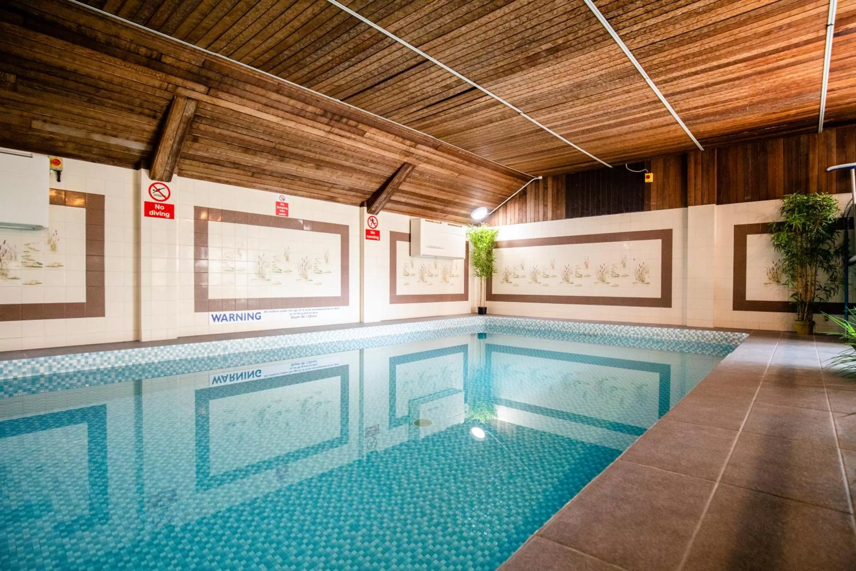 Swimming pool in The Beachcroft Hotel, BW Signature Collection