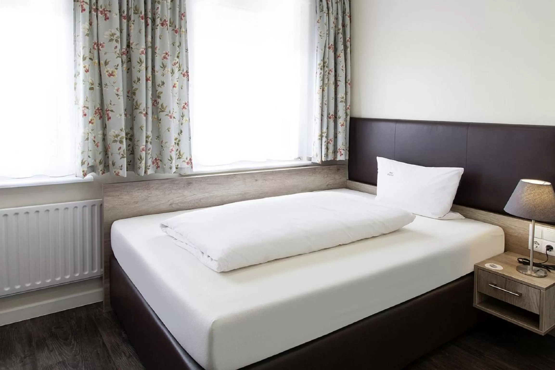 Bed in Hotel Engelbert