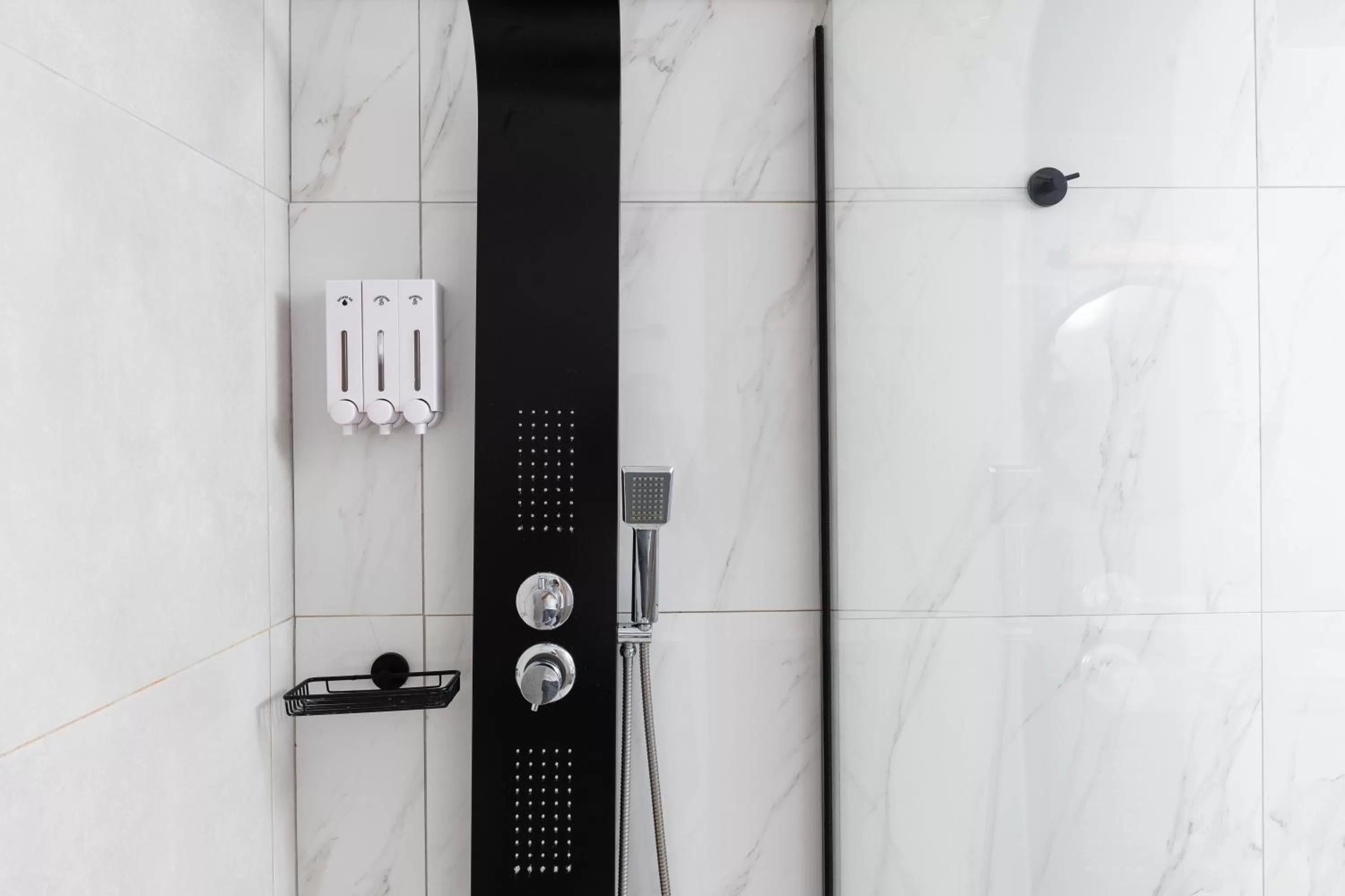 Shower in Enattica Suites