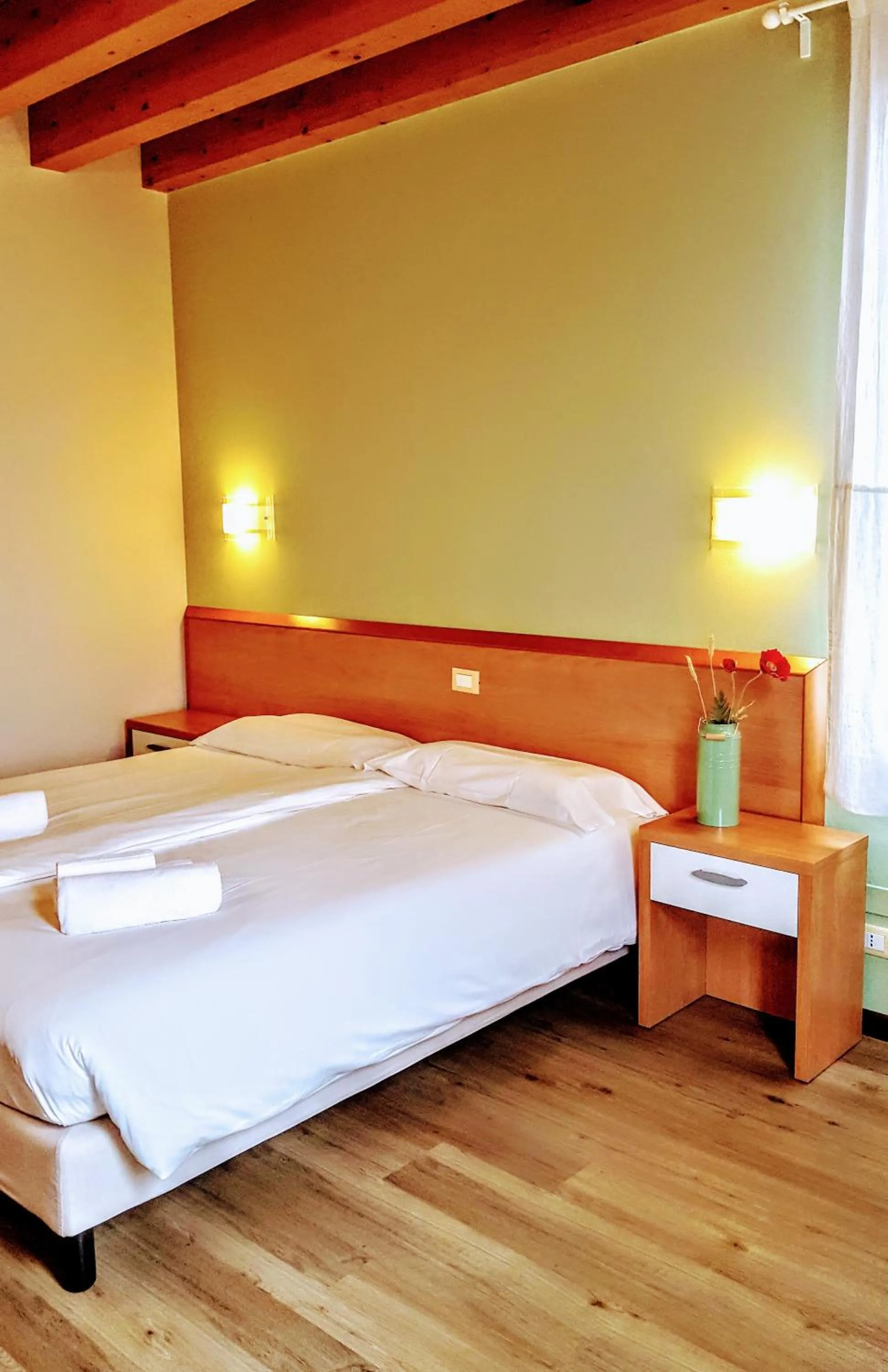 Photo of the whole room, Bed in Locanda Avanguardia