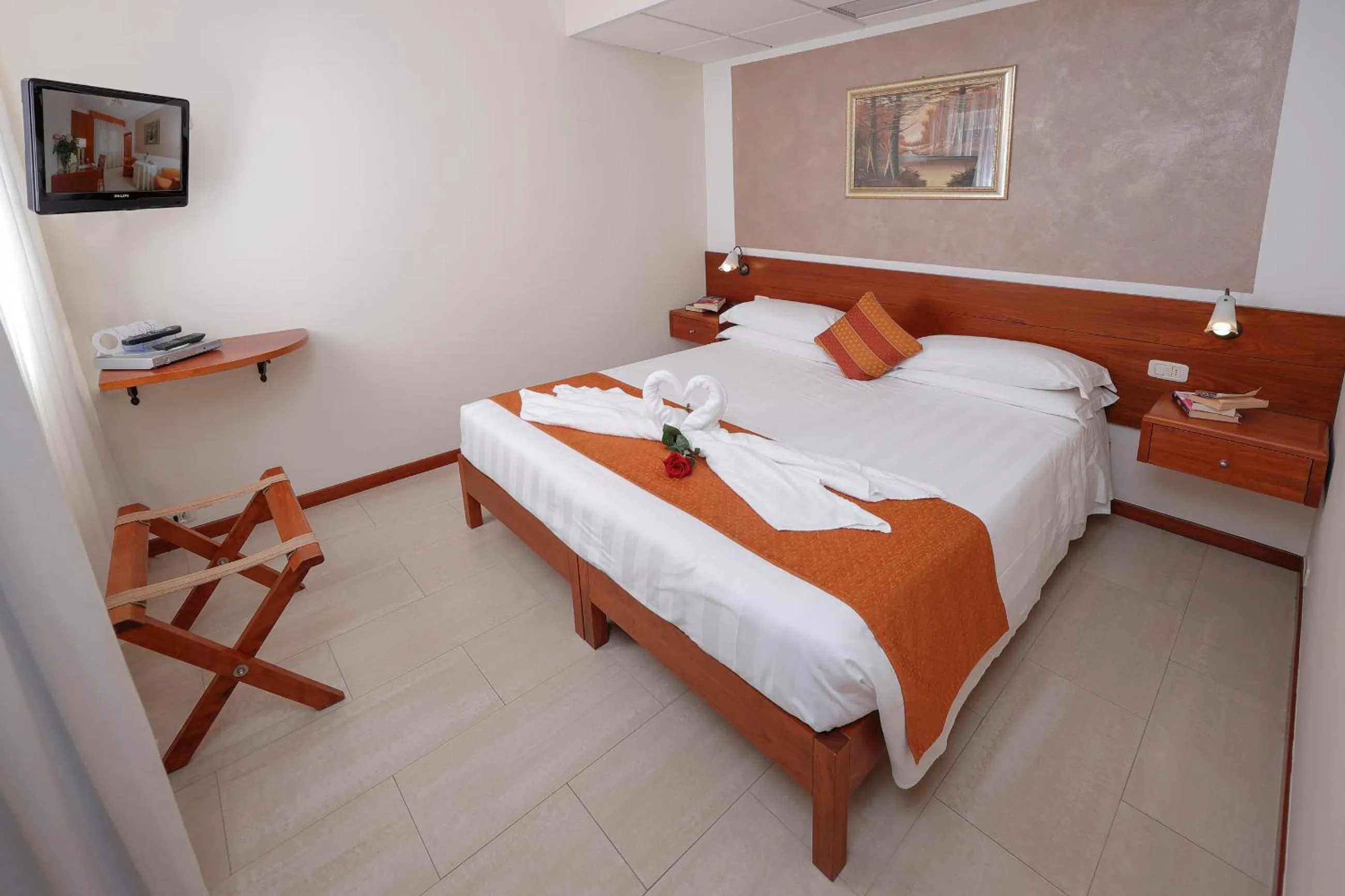 Bed in Hotel Michelangelo