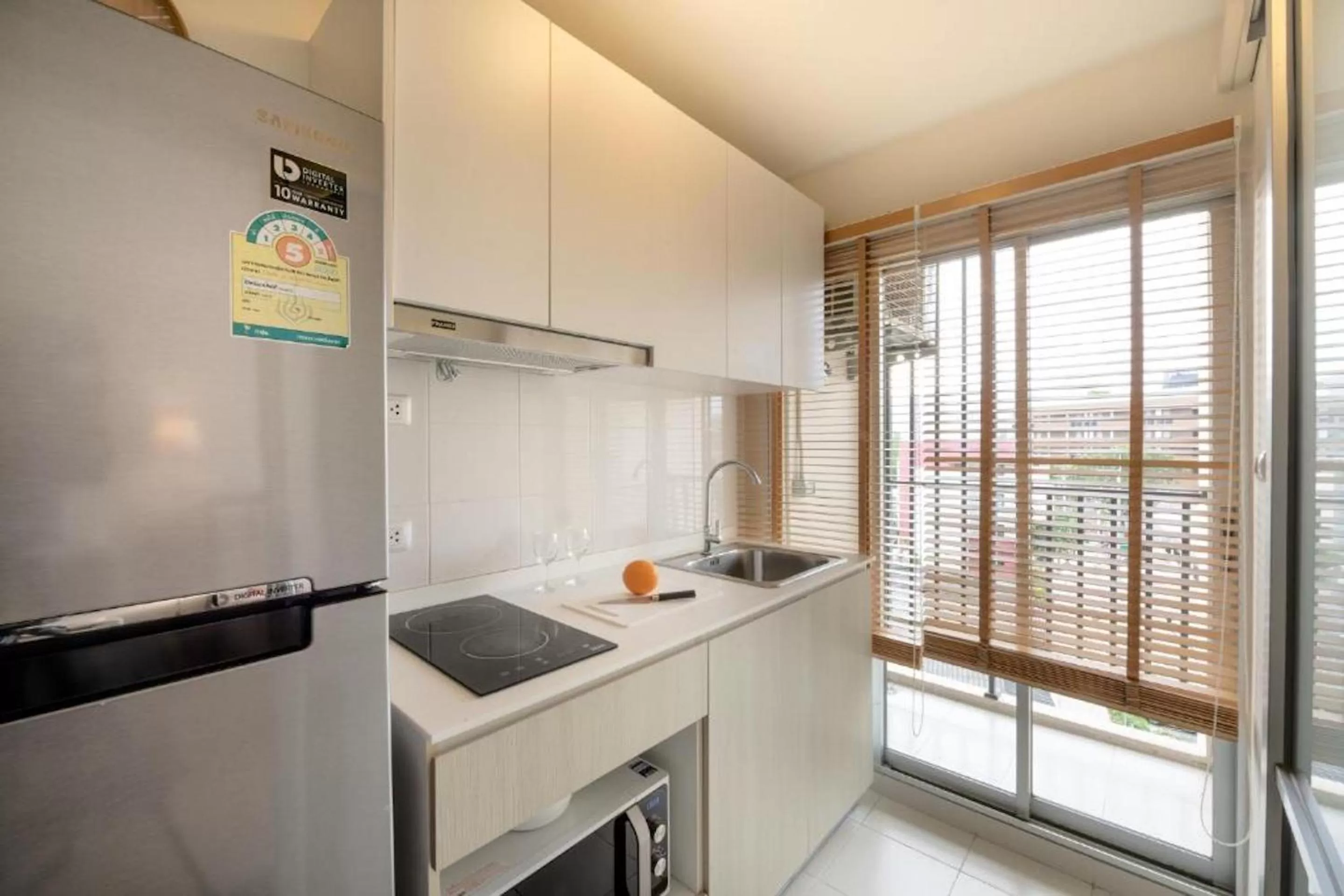 Kitchen or kitchenette in First Choice Suites by the Sea SHA Plus Extra