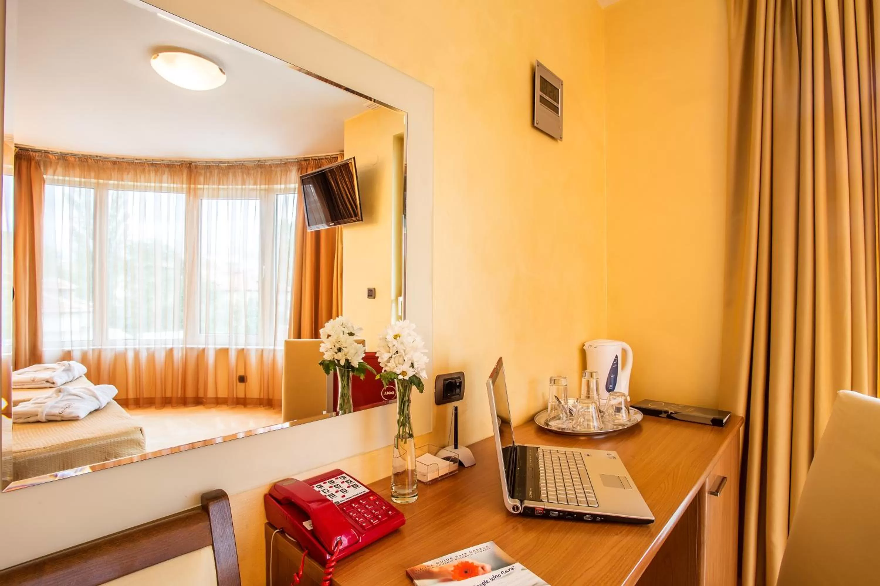 Seating area, Bed in Europe Hotel