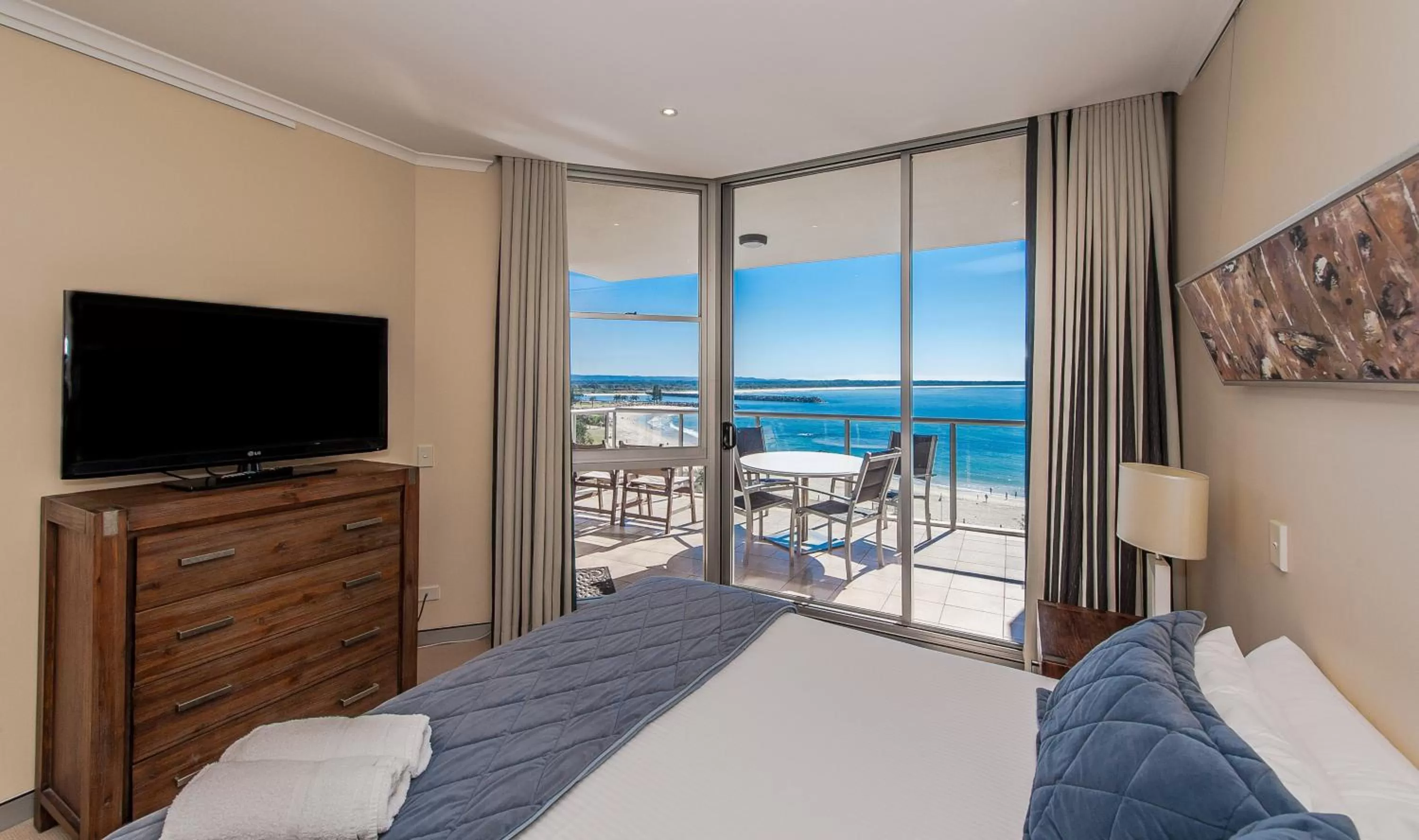 Bedroom, TV/Entertainment Center in Sandcastle Apartments