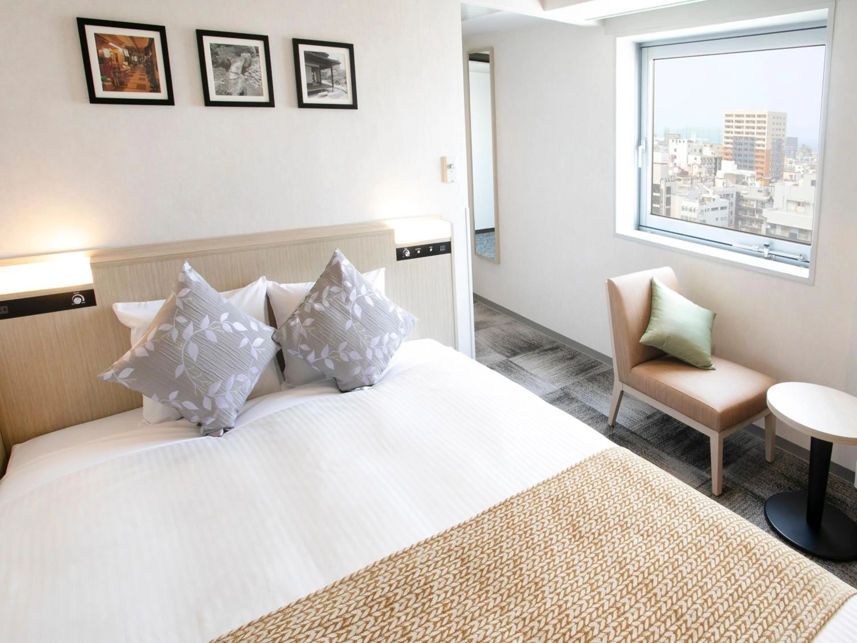 Photo of the whole room, Bed in ART Hotel Oita