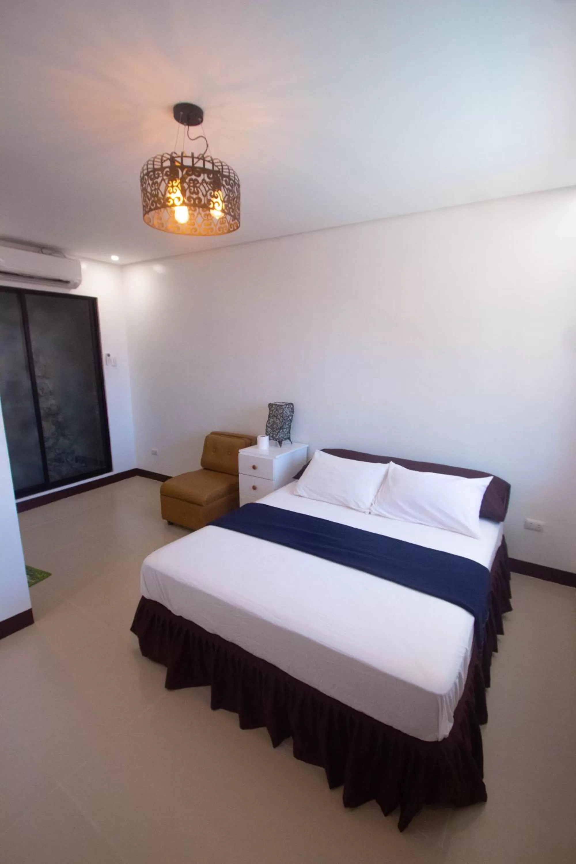 Bed in Raya Del Sol Dive Resort