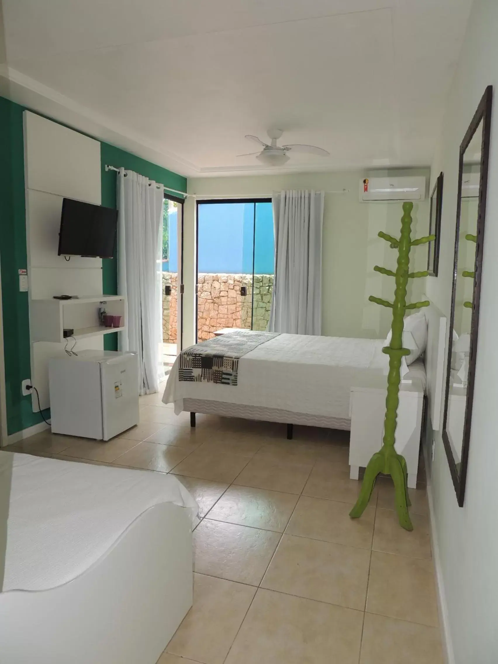 Standard Triple Room in Pousada Akaroa Standard Triple Room in Pousada Akaroa