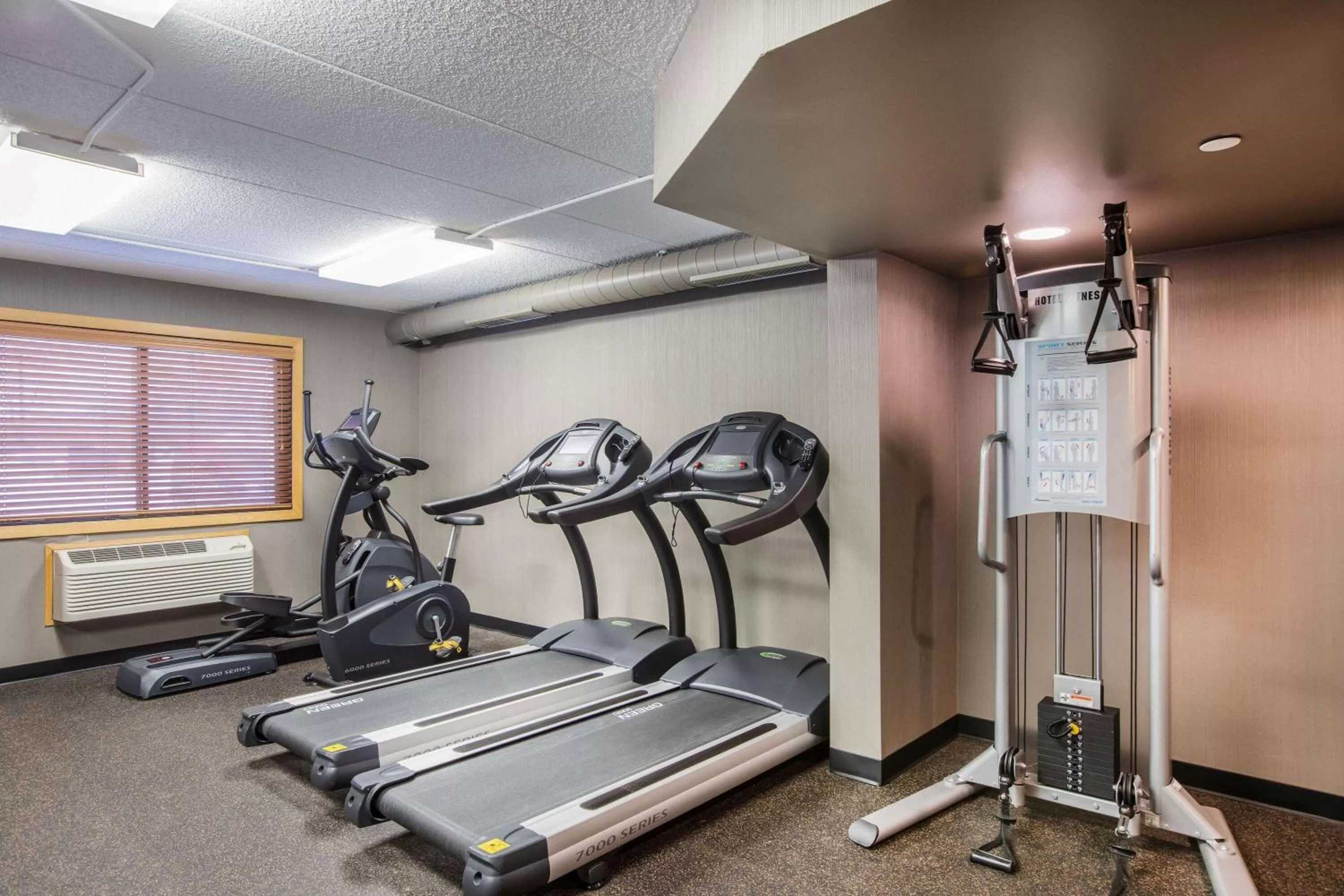 Fitness centre/facilities in AmericInn by Wyndham Grand Forks