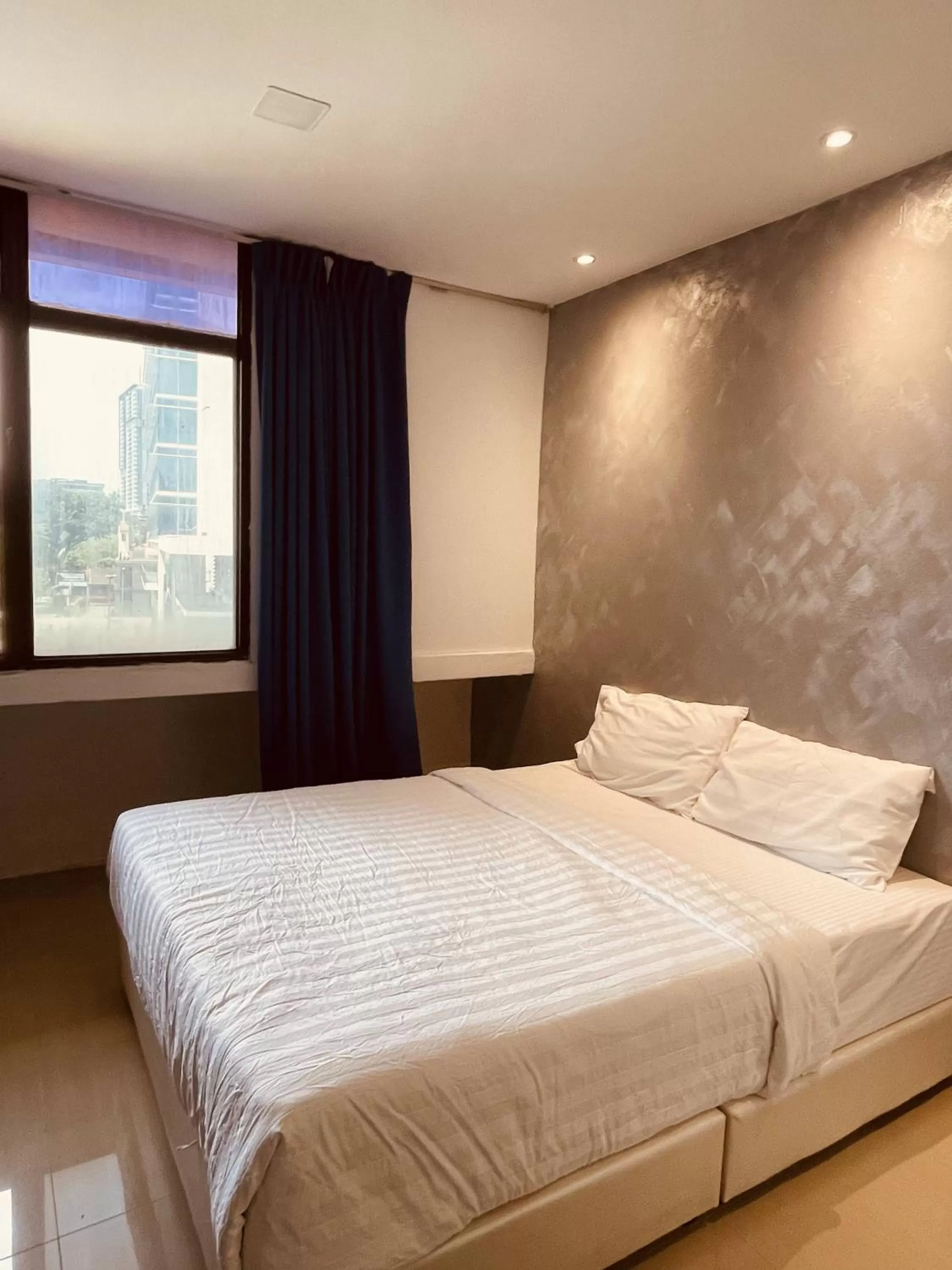 Bed in masroom Hotel Kuala Lumpur