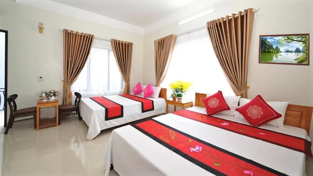 Quadruple Room with Balcony in TAMCOC VUTHANH FRIENDLY Hotel