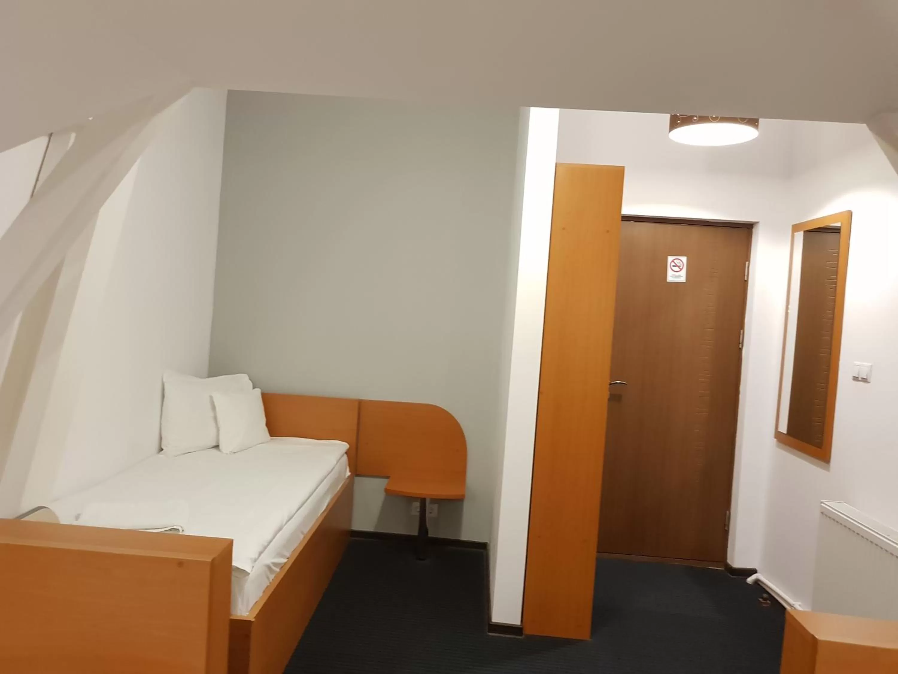 Bed, Seating Area in Prince Hotel