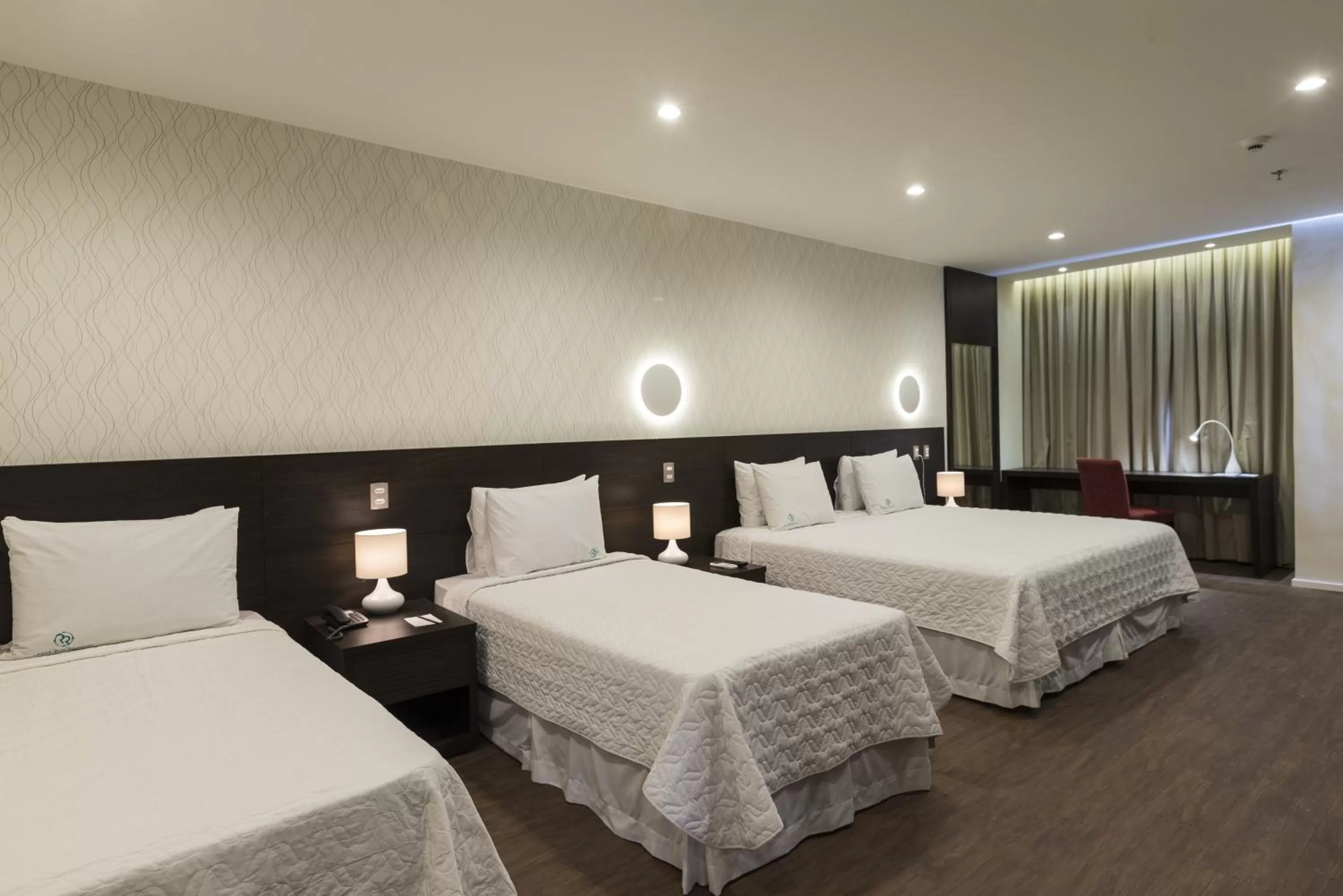 Bed in Arosa Rio Hotel