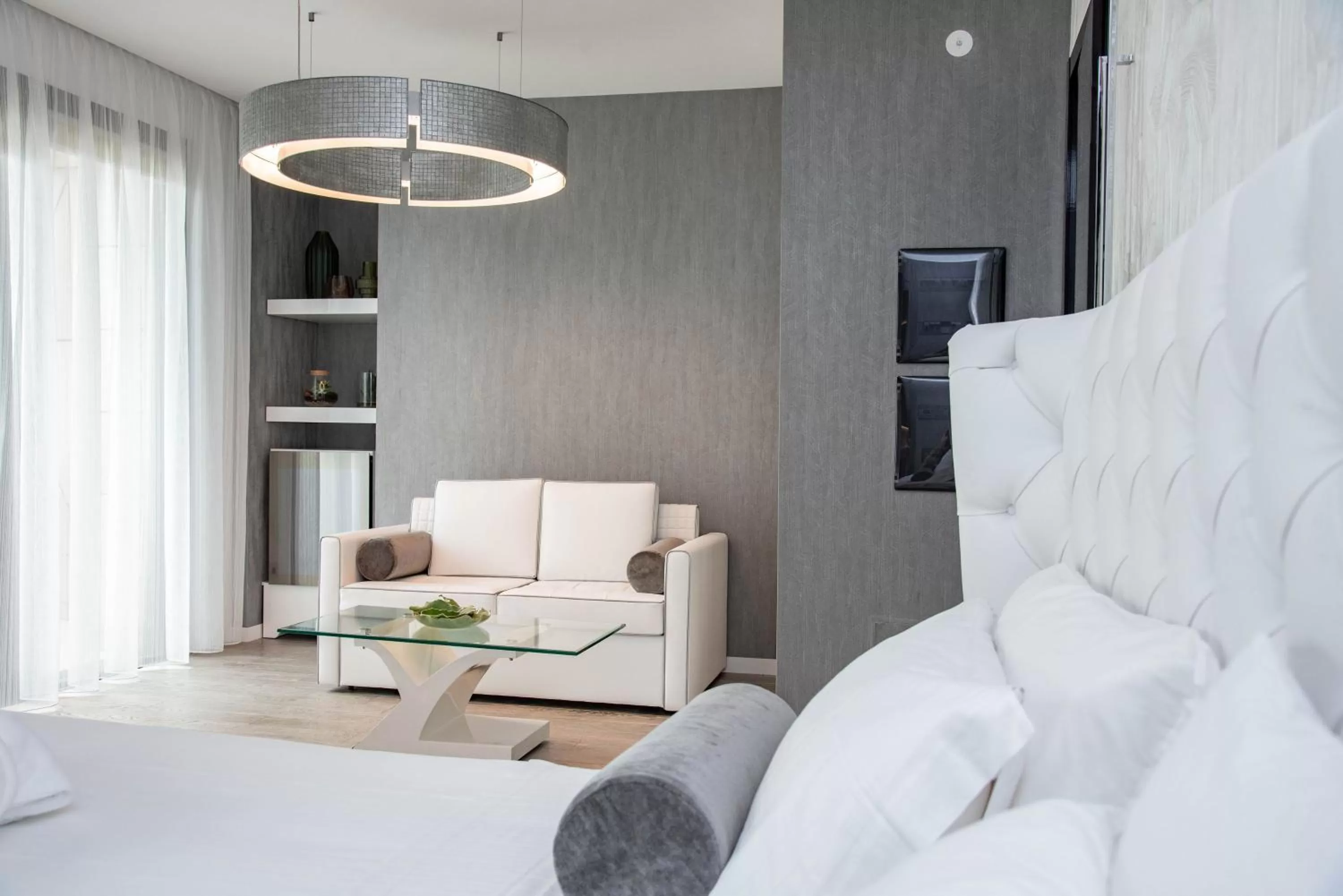 Junior Suite with balcony and side sea view in The Promenade Luxury Wellness Hotel