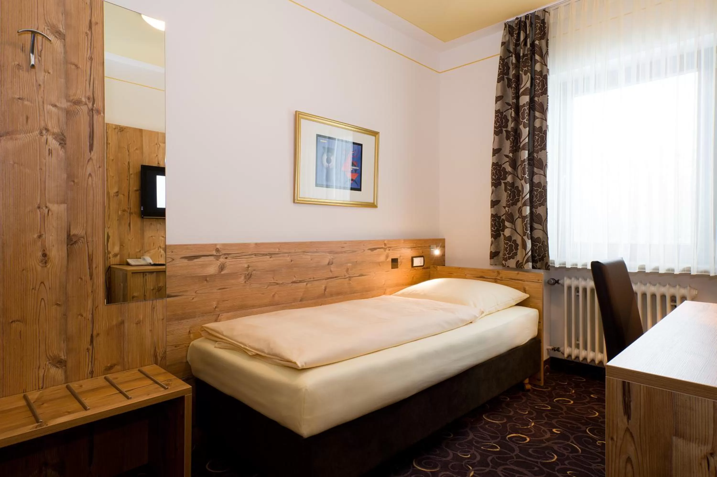 Bed in Hotel SCHNEIDER