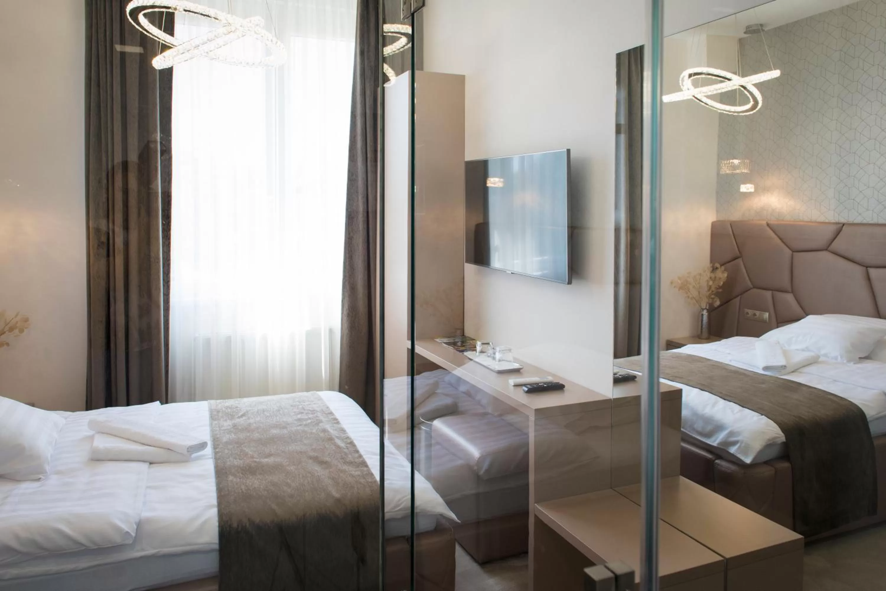 Photo of the whole room, Bed in Z Rooms Boutique