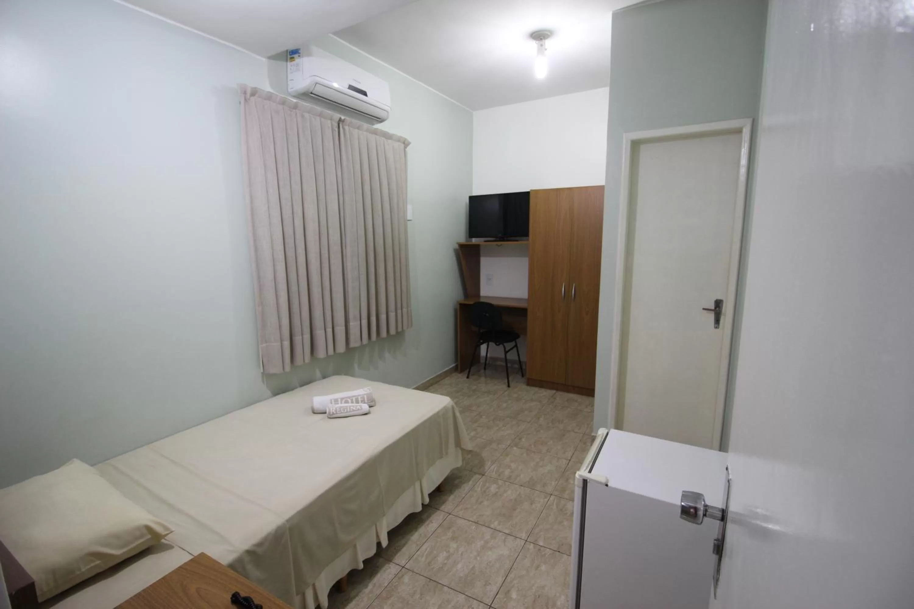 Photo of the whole room, Bed in Hotel Regina Muriaé