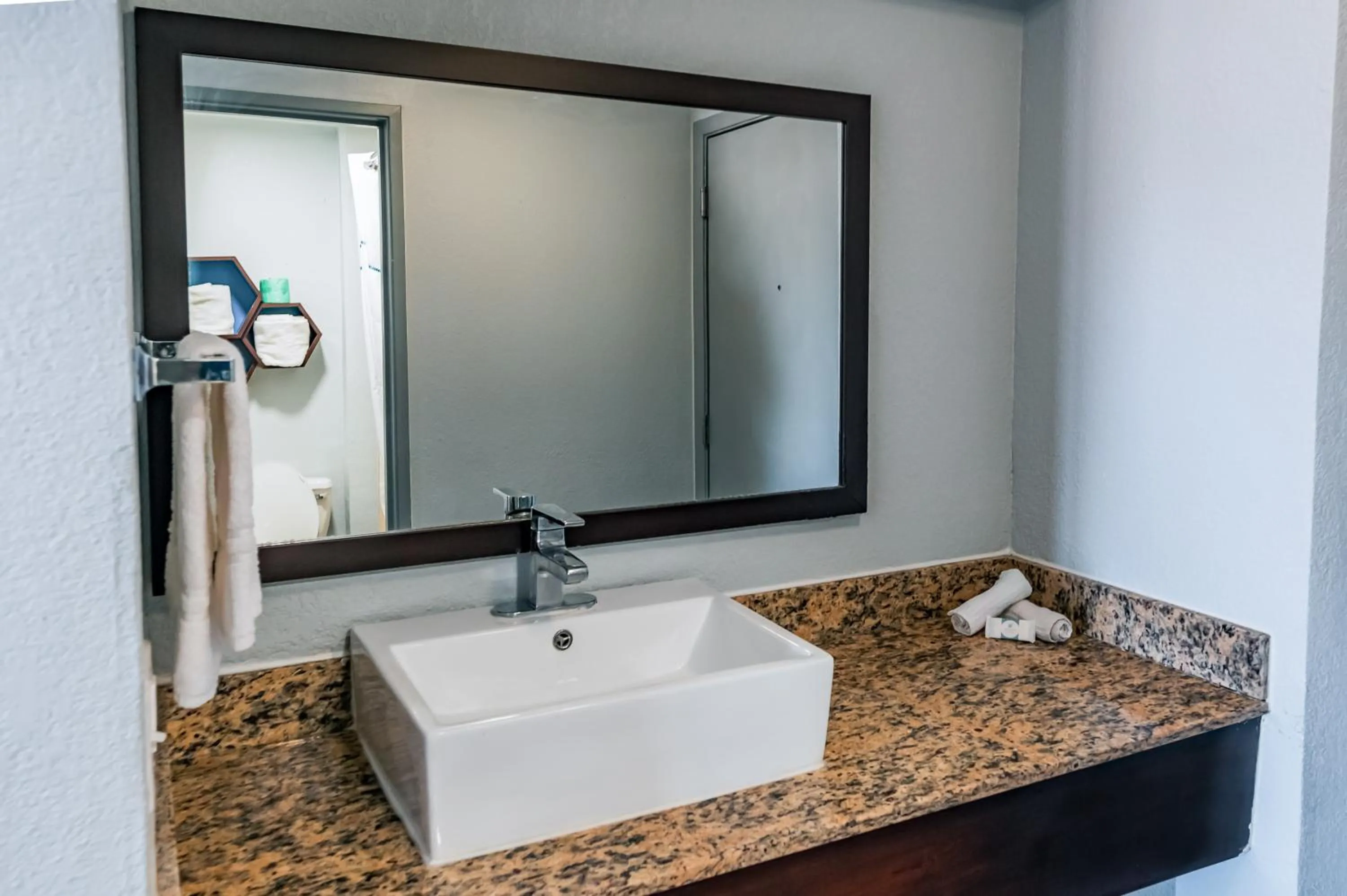 Bathroom in HomeTowne Studios by Red Roof San Antonio - SeaWorld Northwest