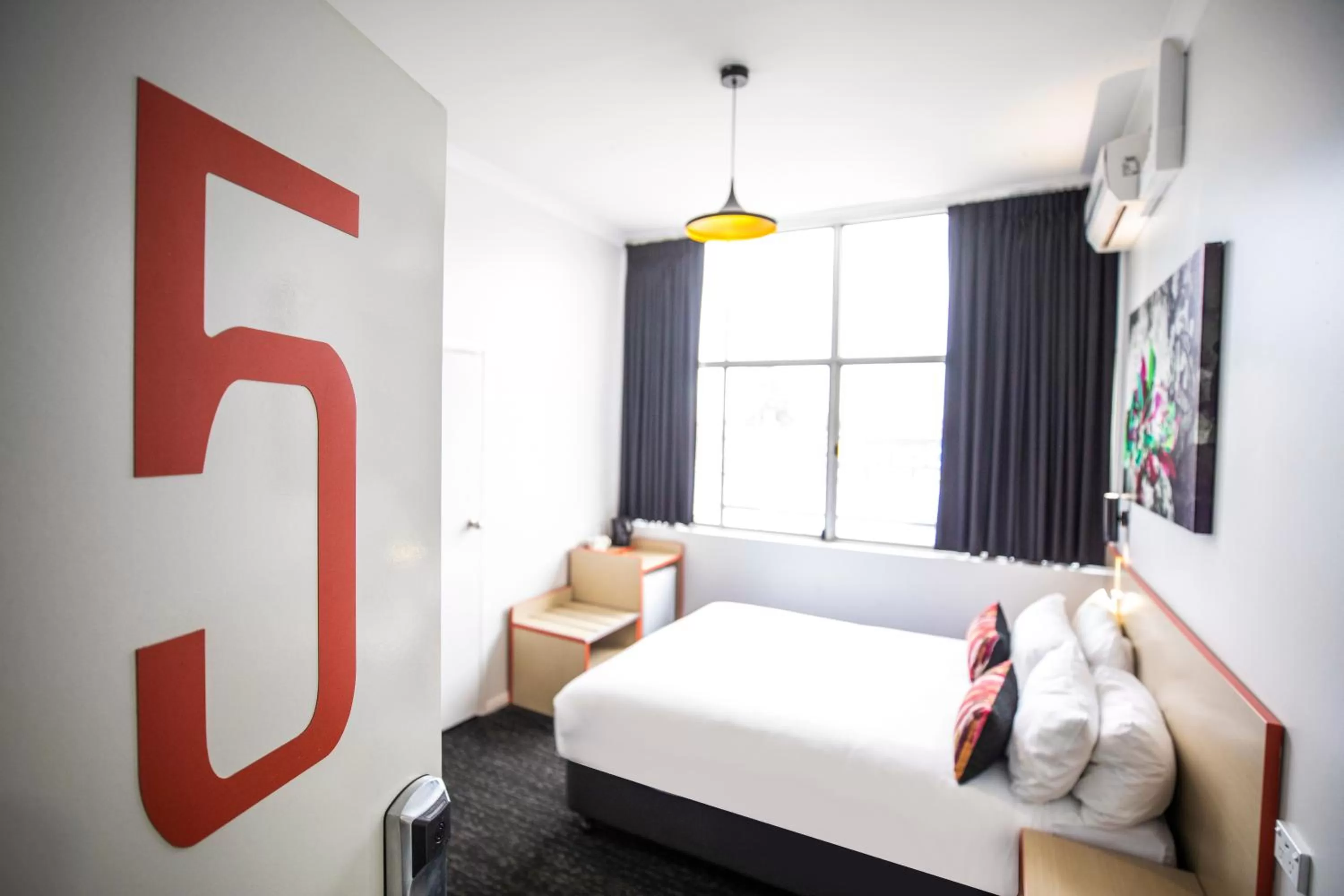 Bedroom, Bed in Nightcap at Ashley Hotel