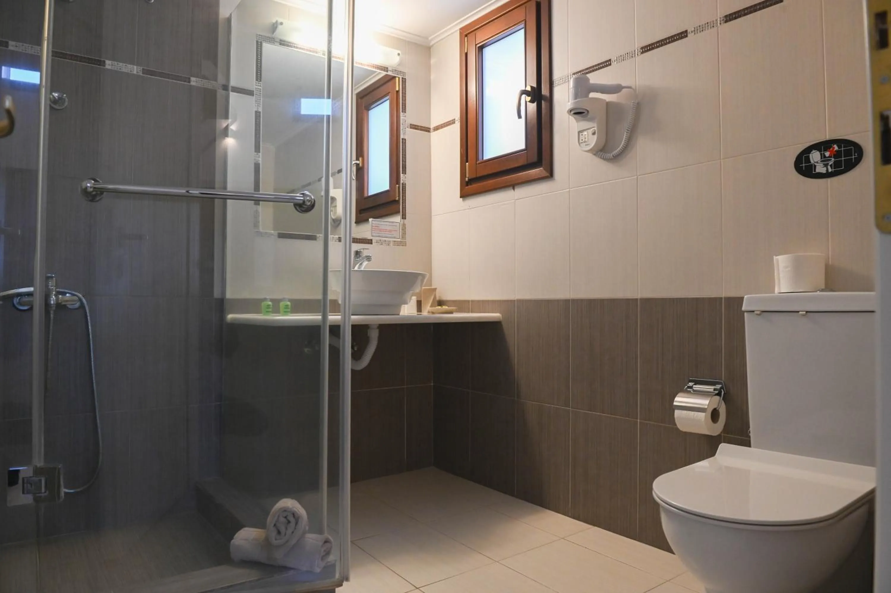 Bathroom in Amerisa Suites & Villa