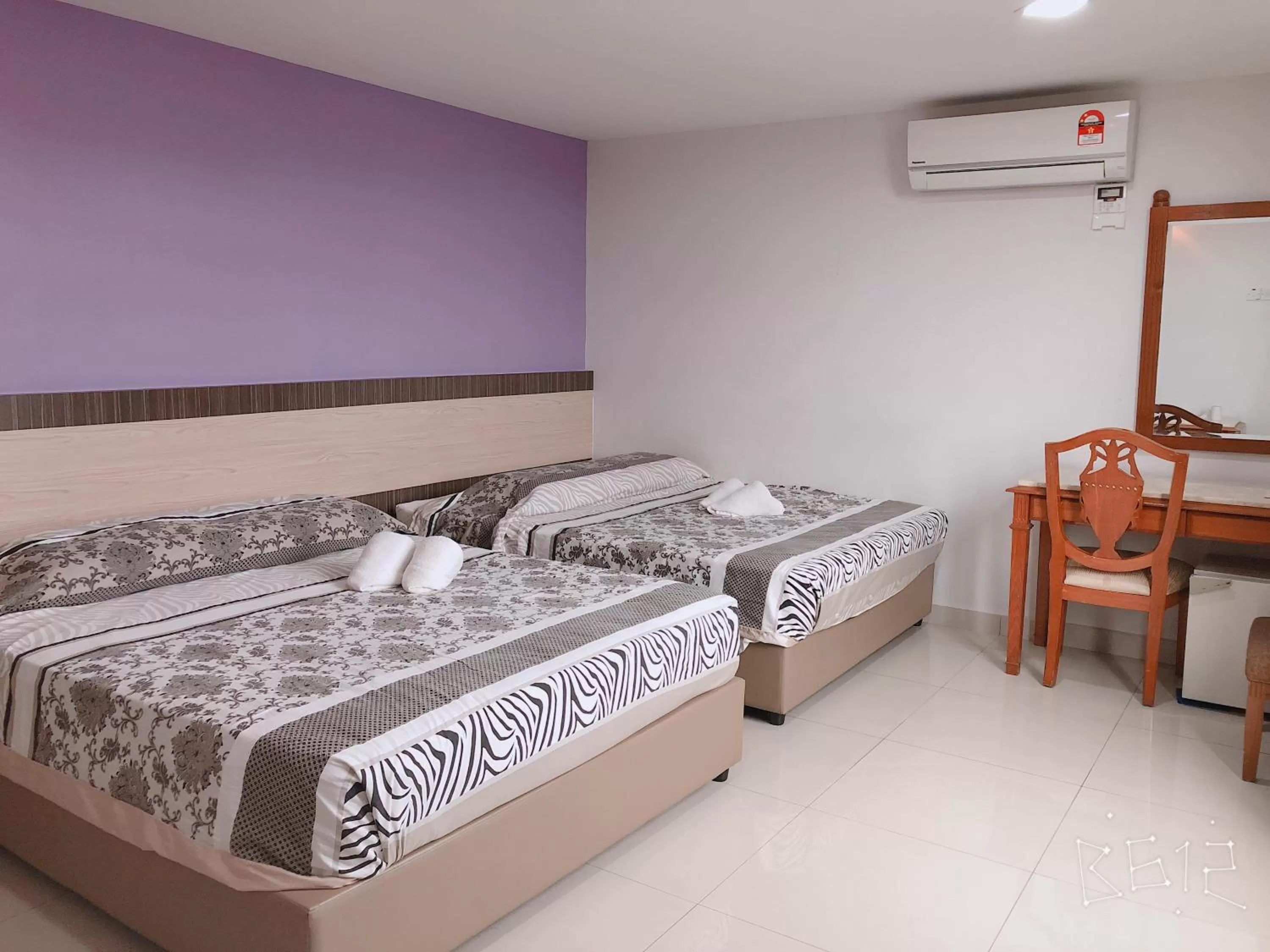 Photo of the whole room, Bed in G Star Hotel