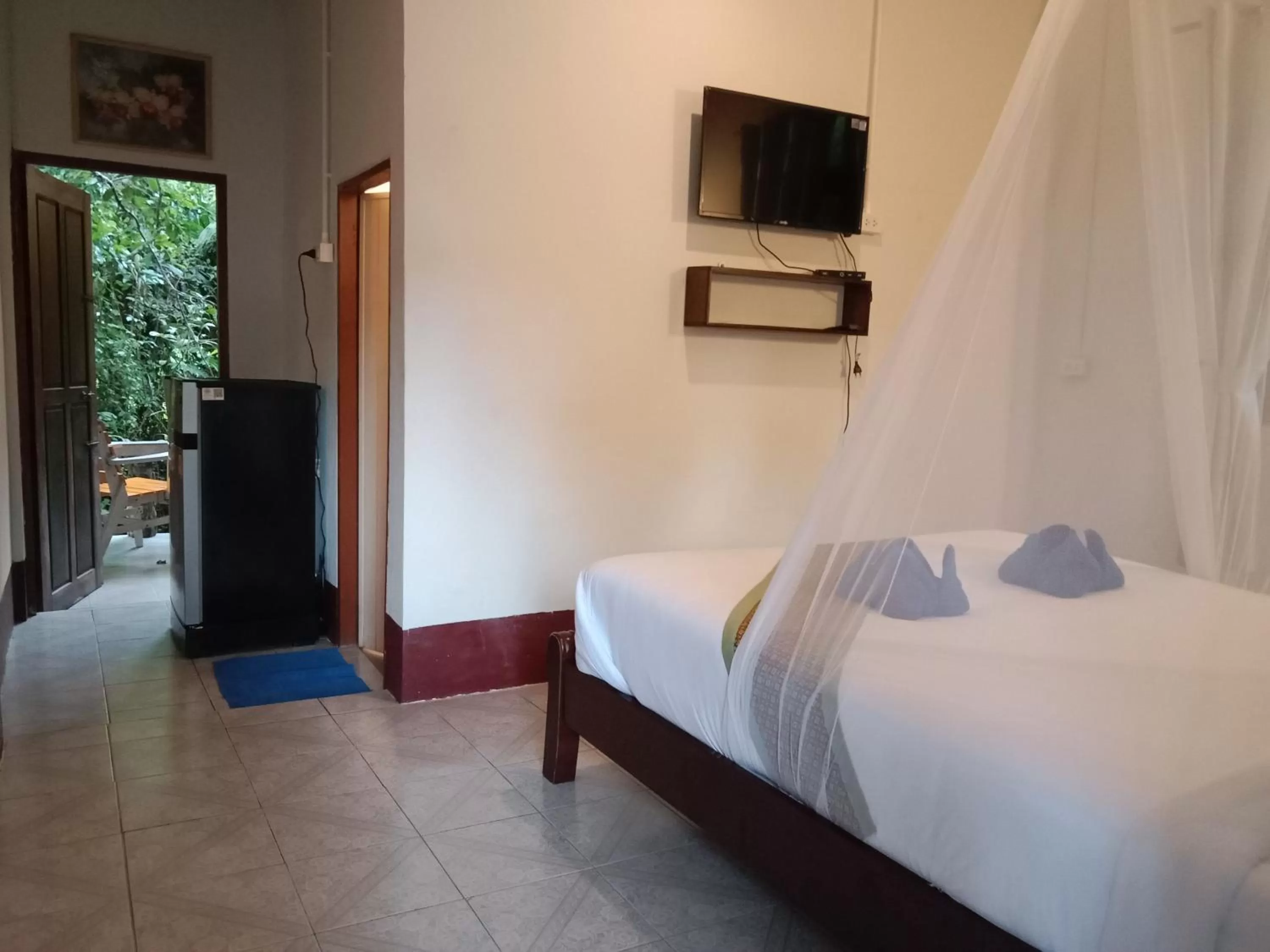 Bed in Tree Tops River Huts