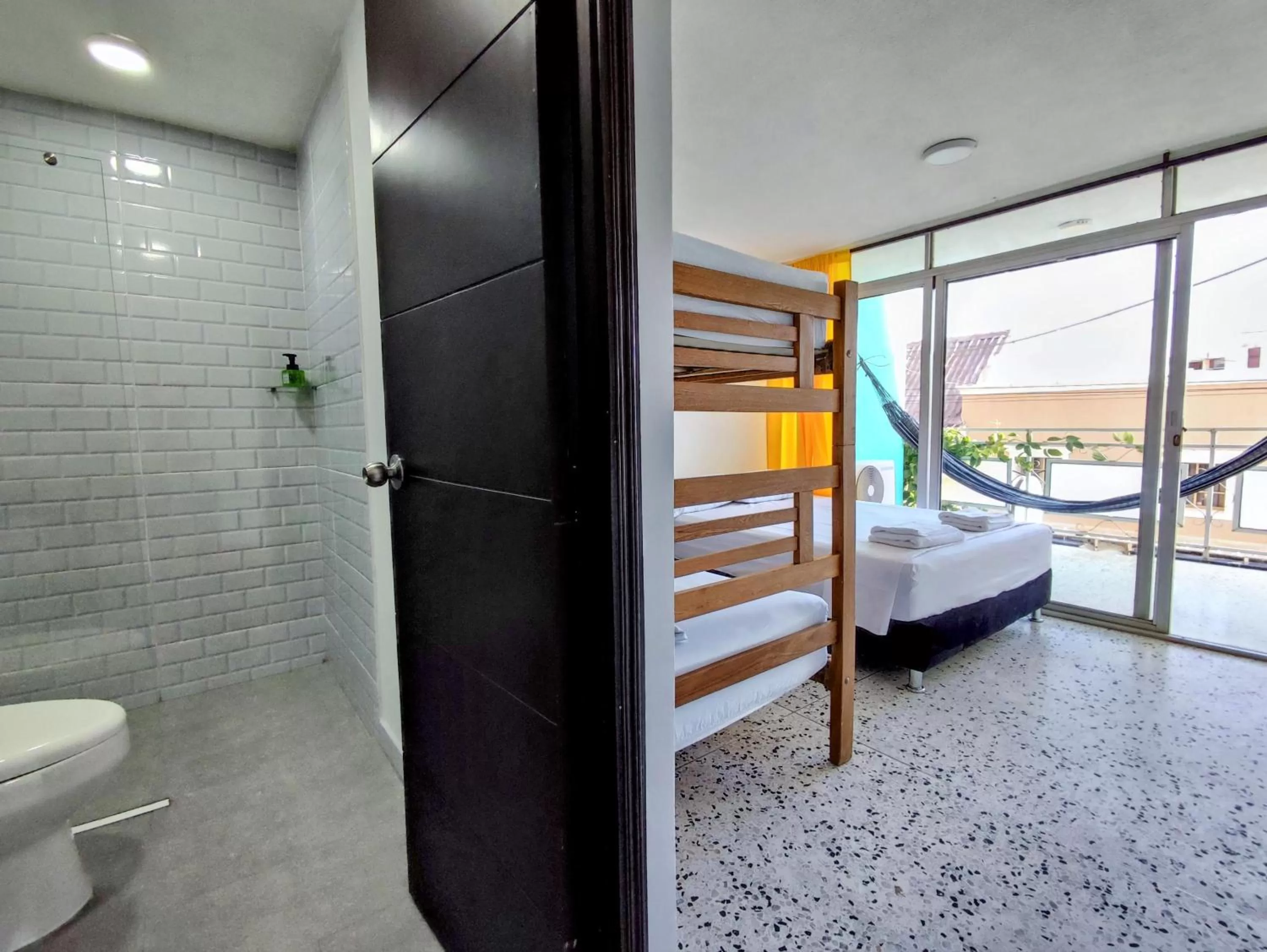 Bed in Bona Vida Hotel