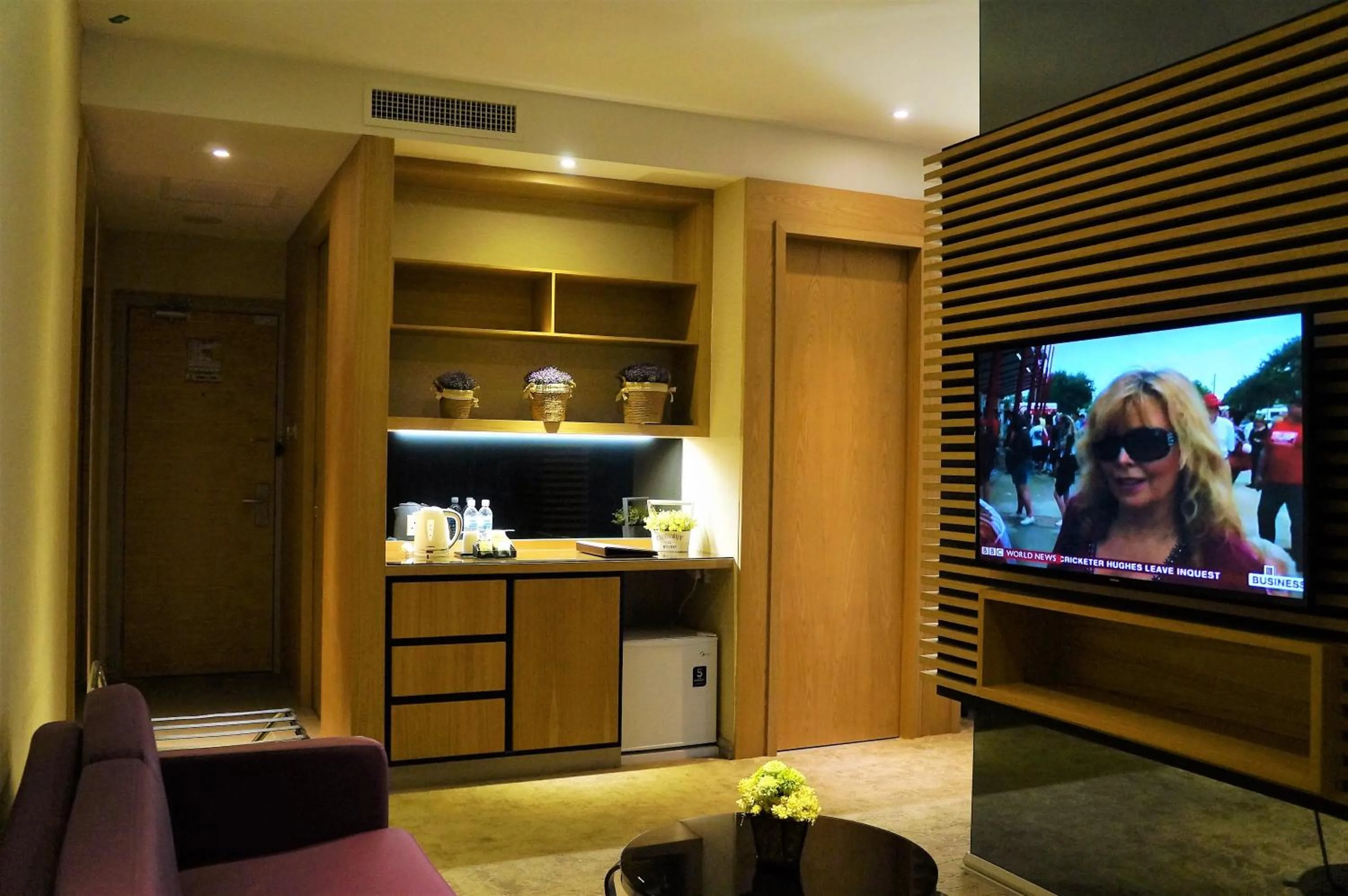 Bed in Greens Hotel & Suites