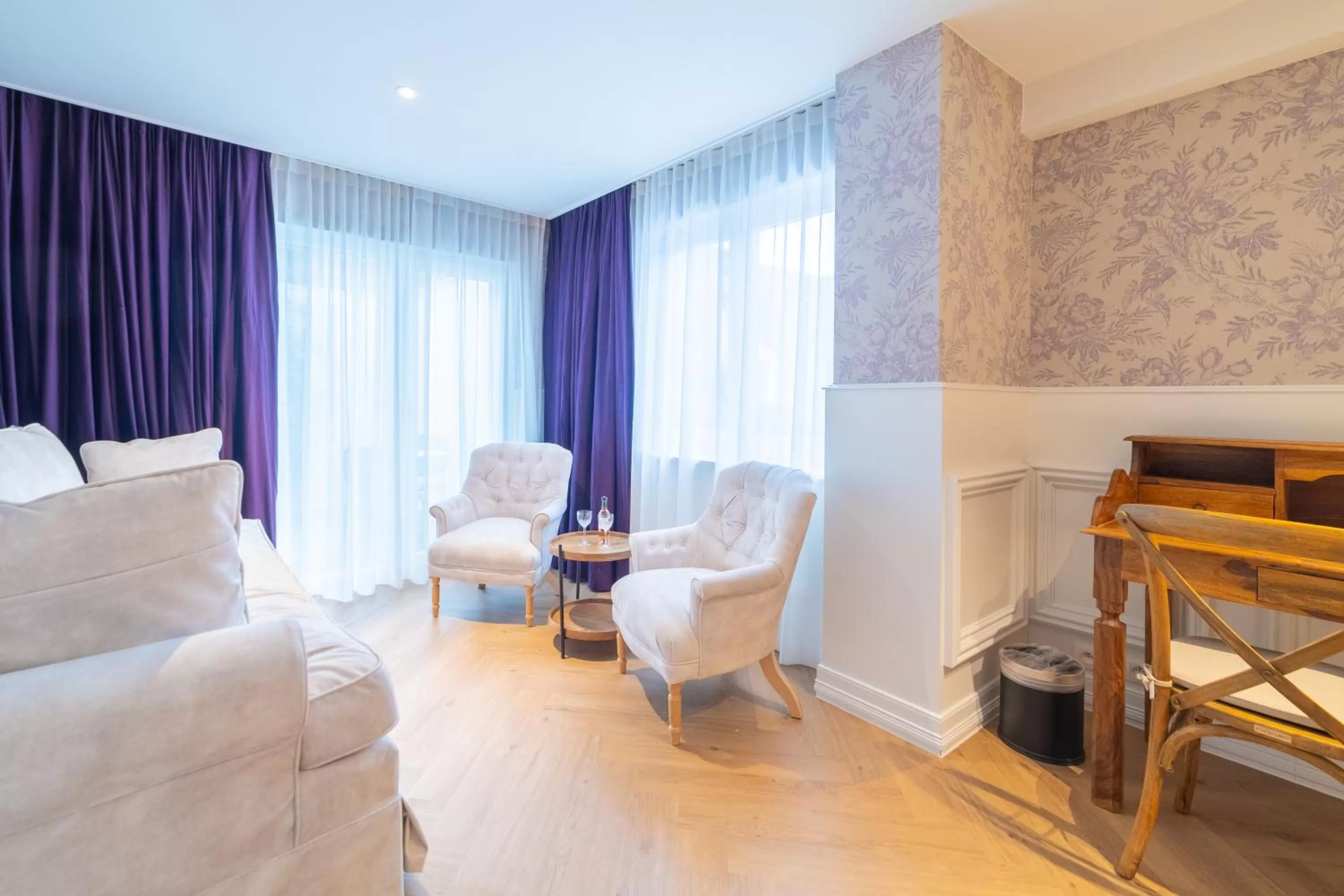 Seating area in Grand Hotel Normandy by CW Hotel Collection