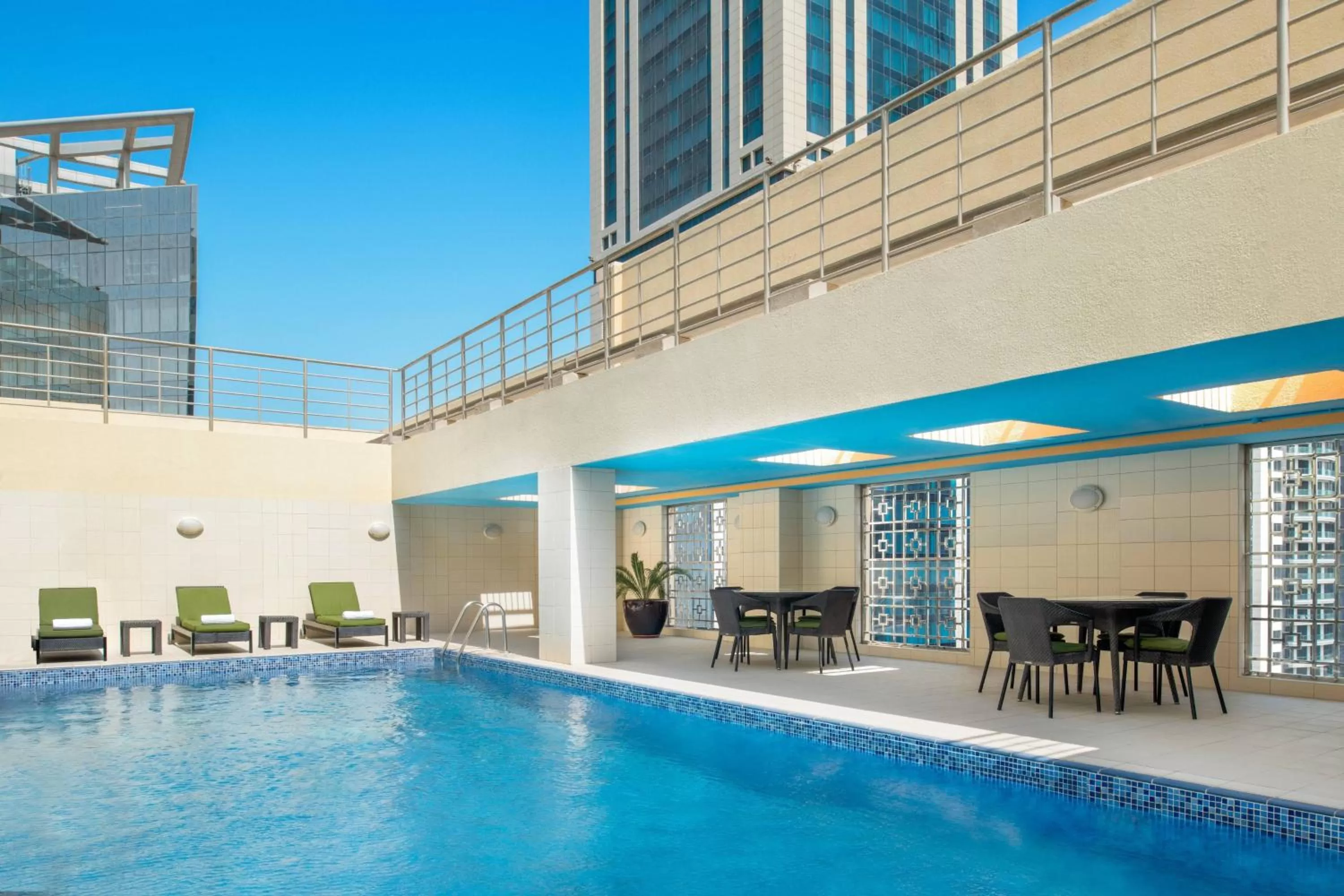 Swimming pool in Marriott Executive Apartments City Center Doha