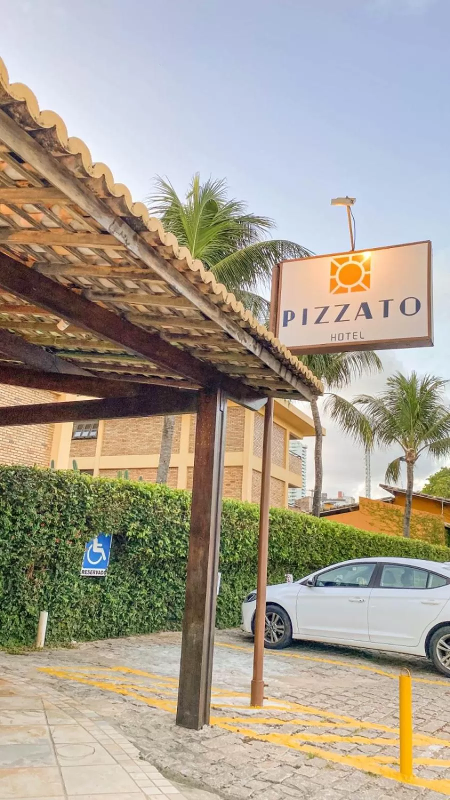 Property logo or sign in Pizzato Praia Hotel