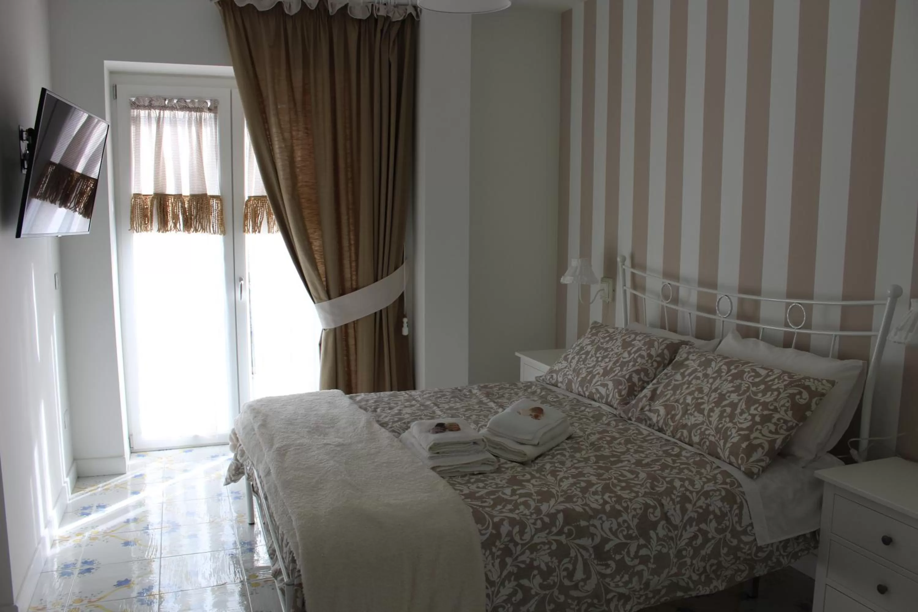 Bed in IL GIARDINO DEI GLICINI