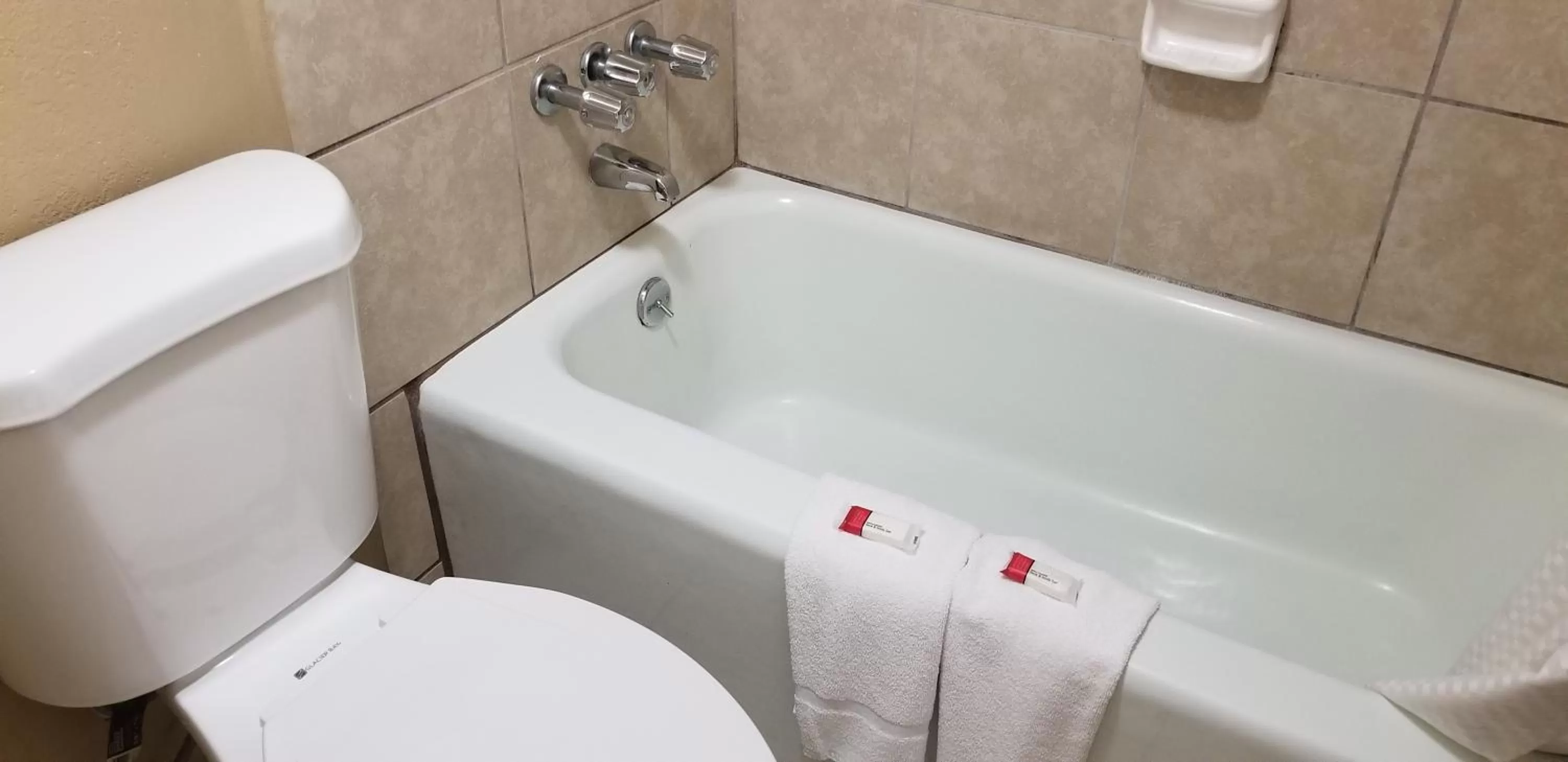 Bathroom in Days Inn by Wyndham Cocoa Cruiseport West At I-95/524