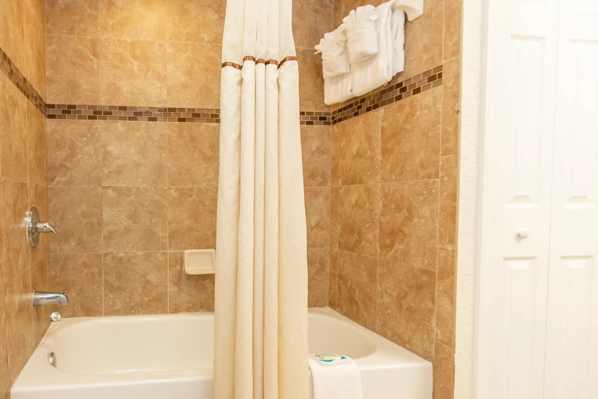 Shower, Bathroom in Coconut Cove All Suite Hotel