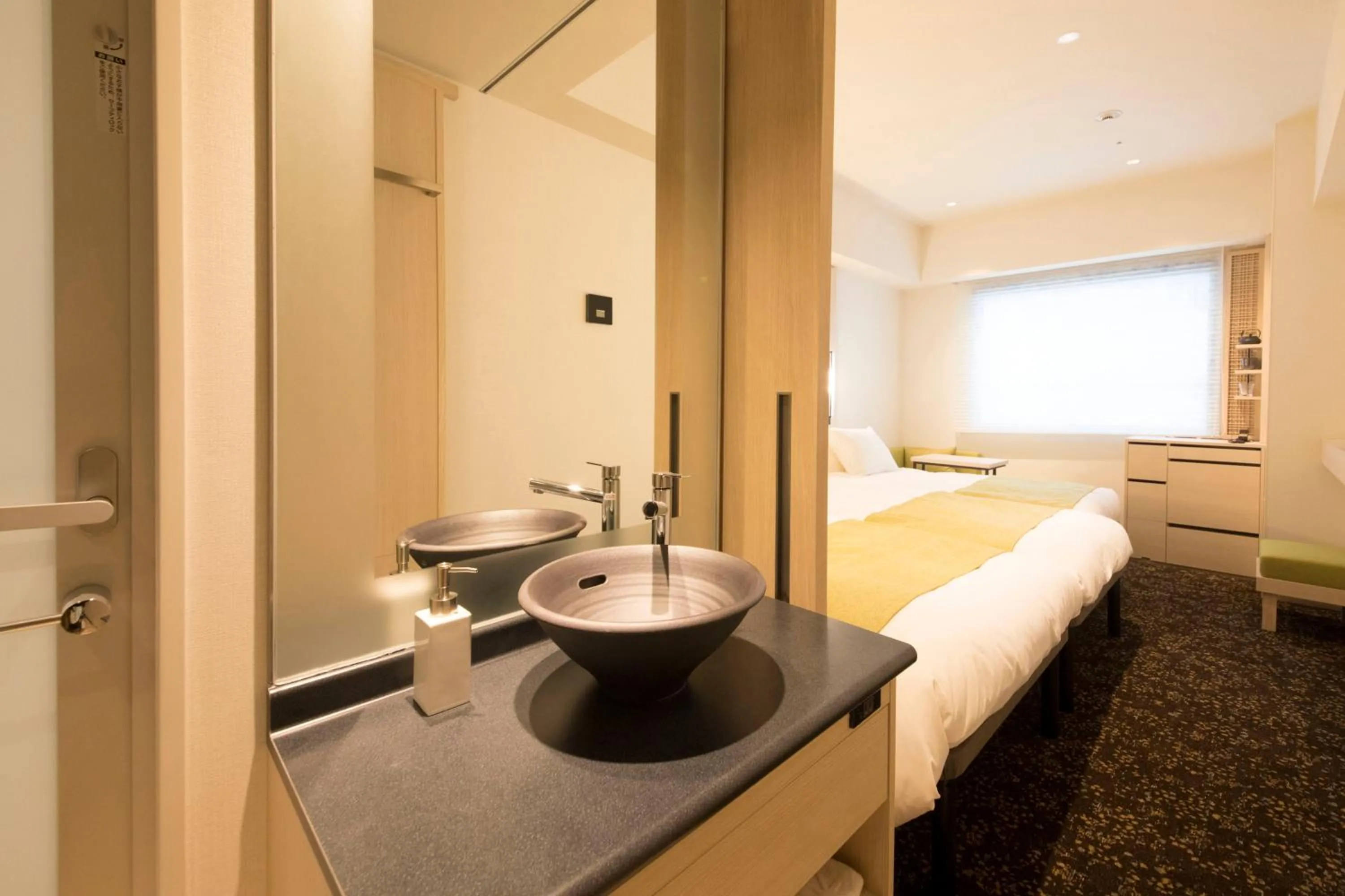 Decorative detail, Bed in Hotel Yaenomidori Tokyo