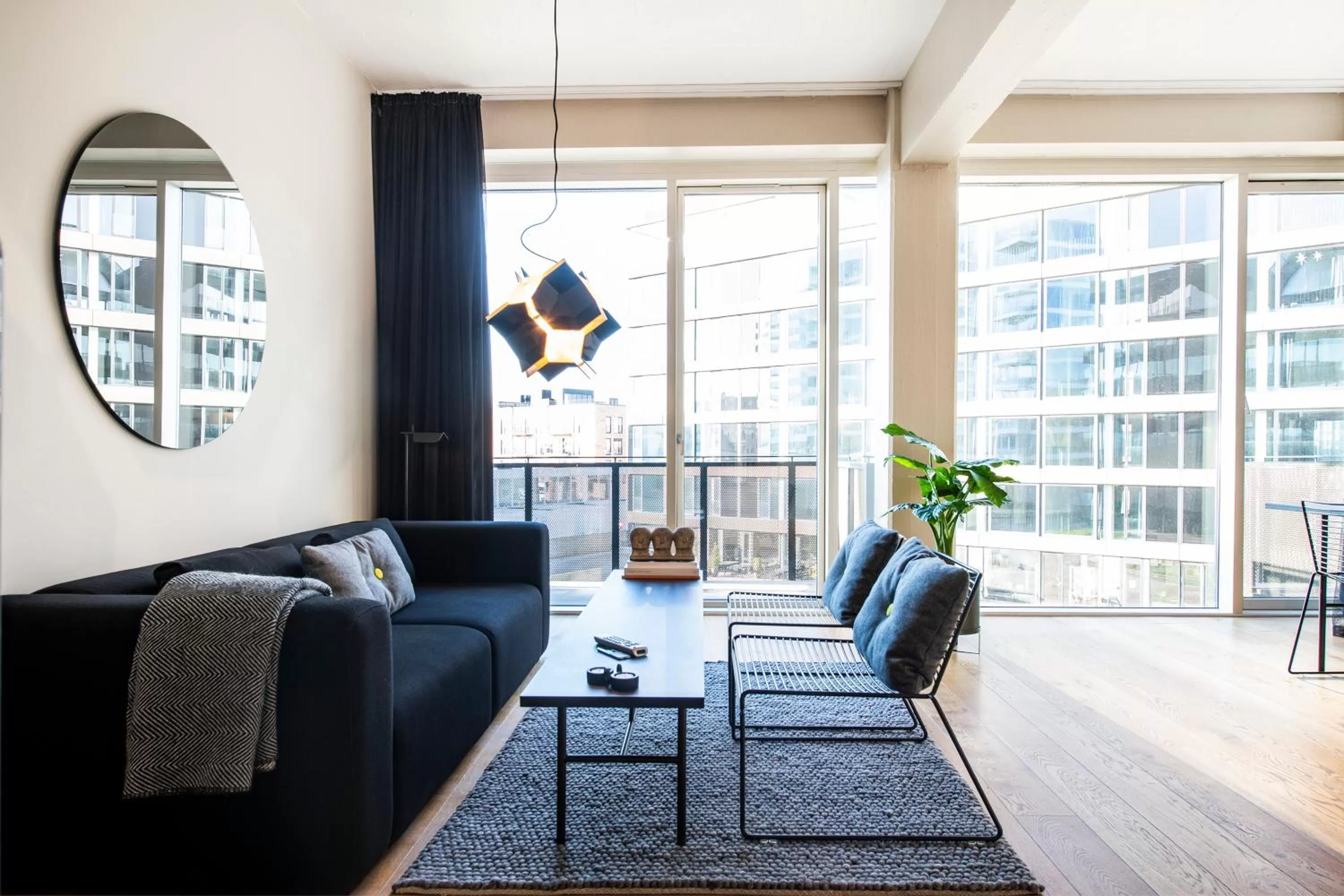 Living room, Seating Area in By The Pier apartments - Into This Place