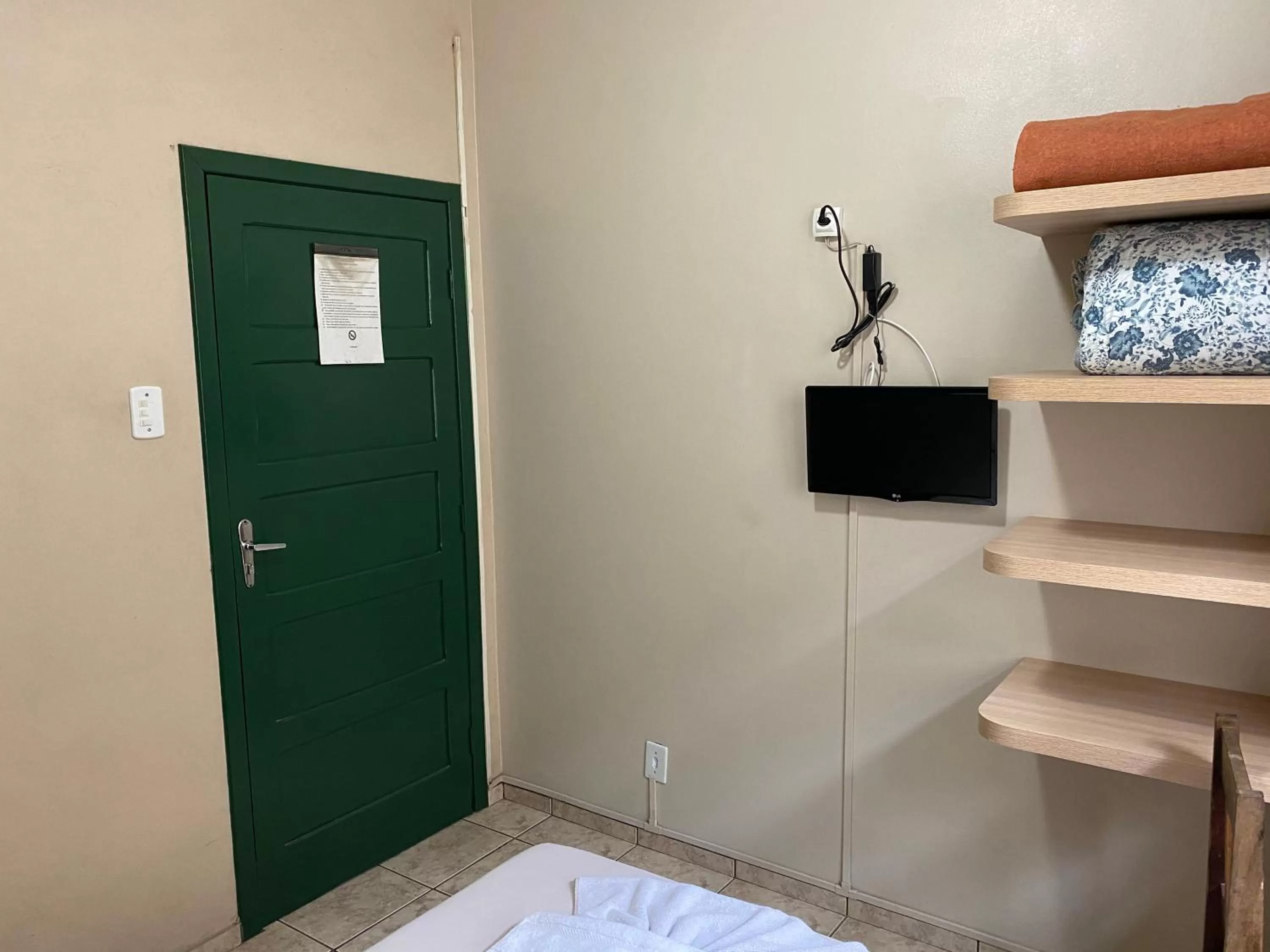 Bedroom, TV/Entertainment Center in Hotel Bavarium