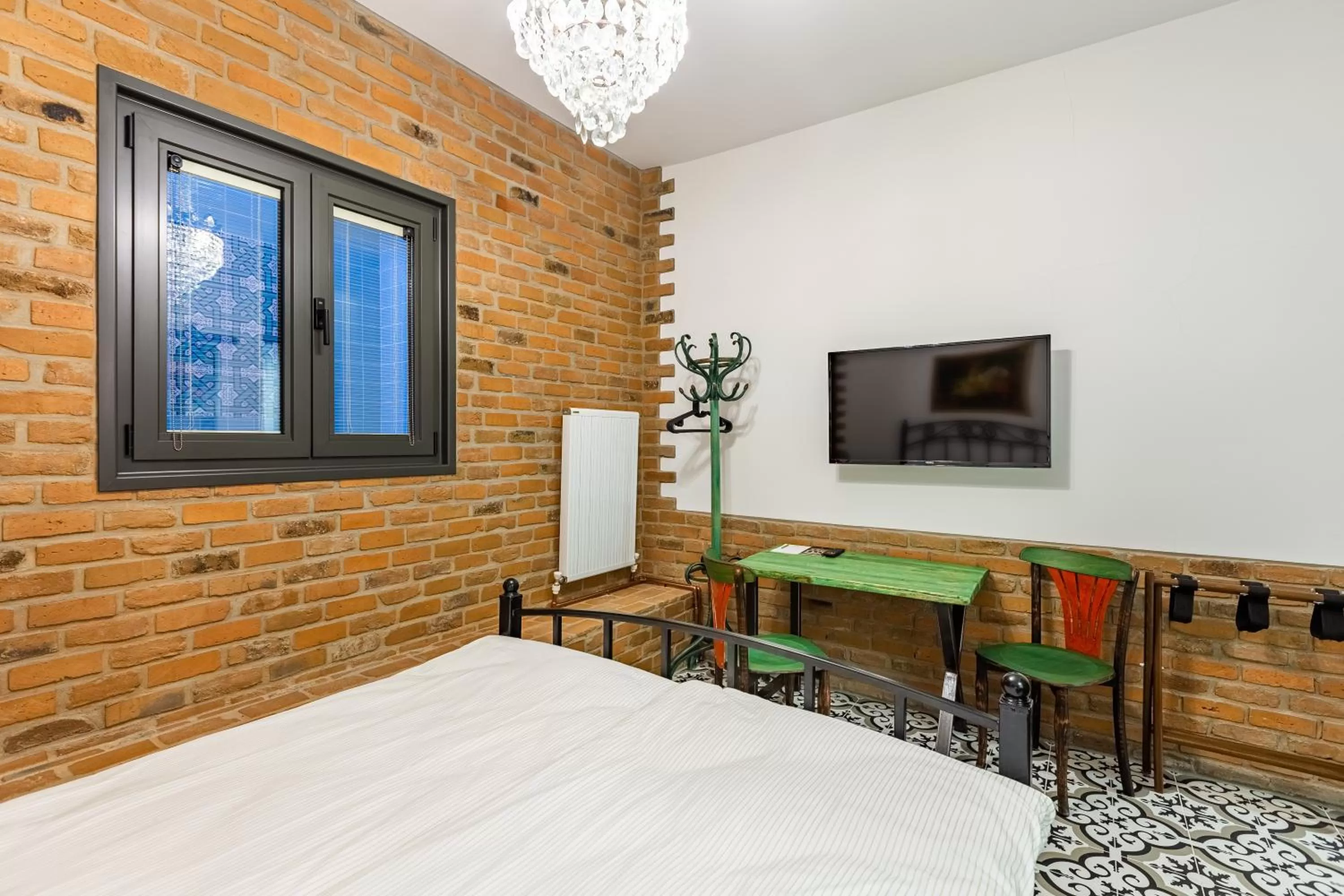 Communal lounge/ TV room, Bed in Villa Pera Suite Hotel