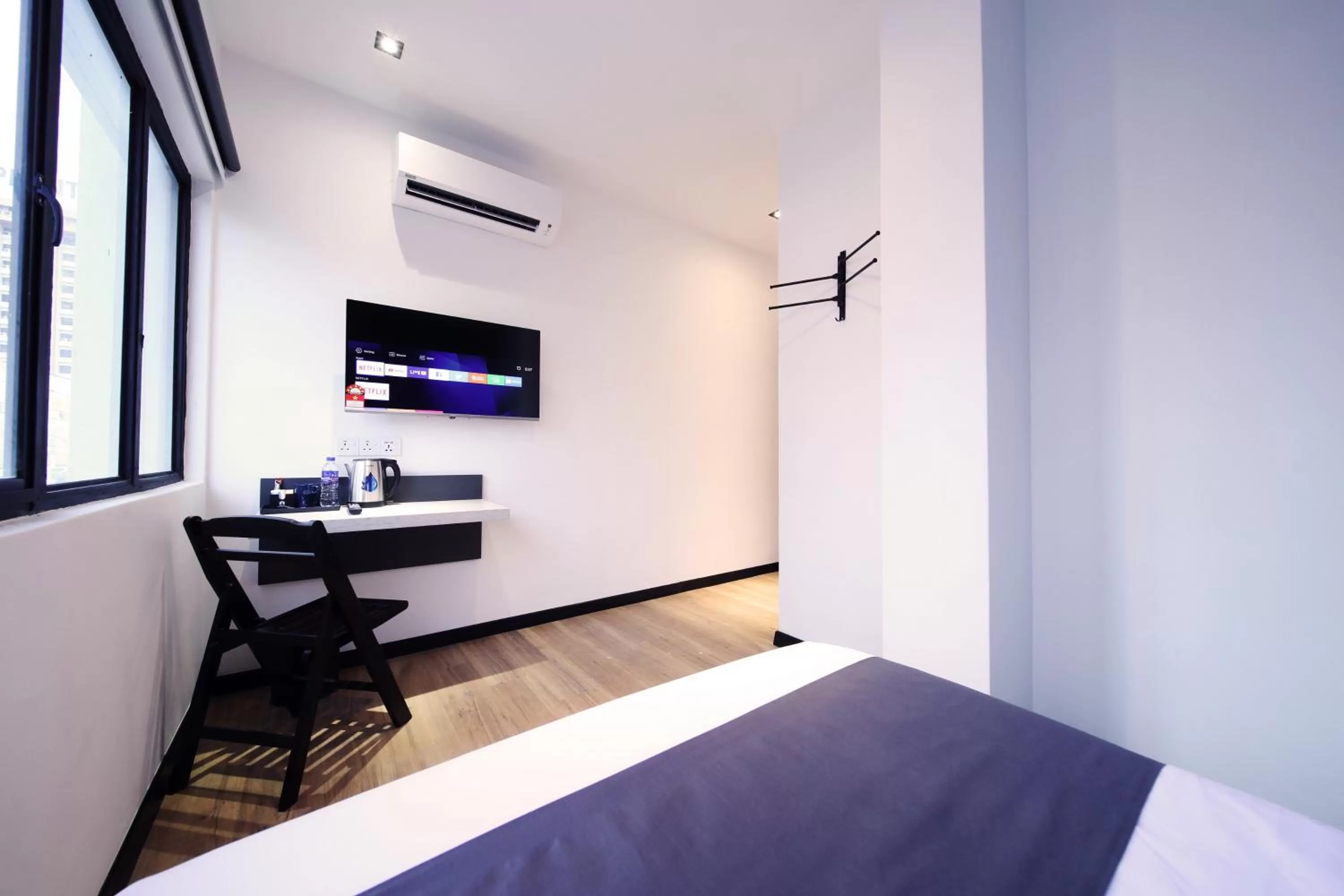 Communal lounge/ TV room, Bed in ARENA Boutique Hotel Kuala Terengganu