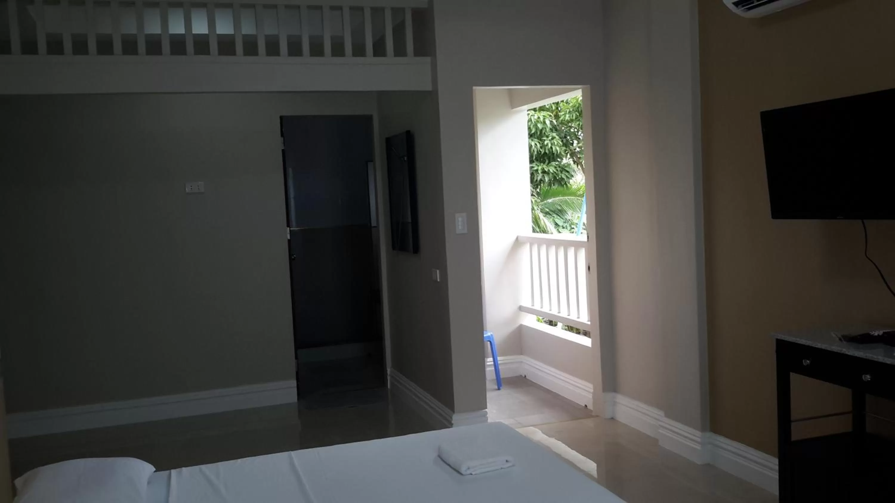 Bed in Sandscape Hotel