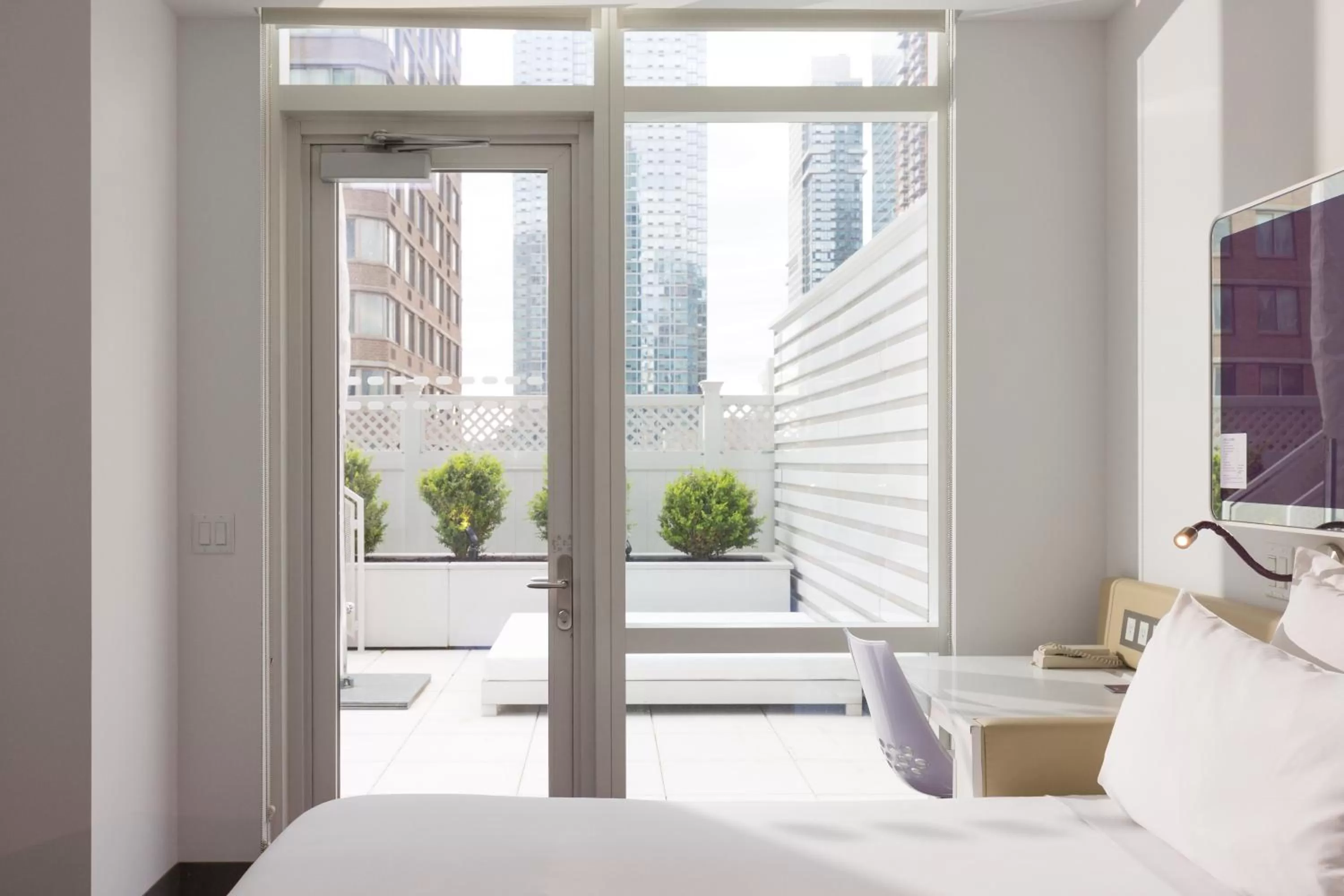 Balcony/Terrace, Bed in YOTEL New York Times Square